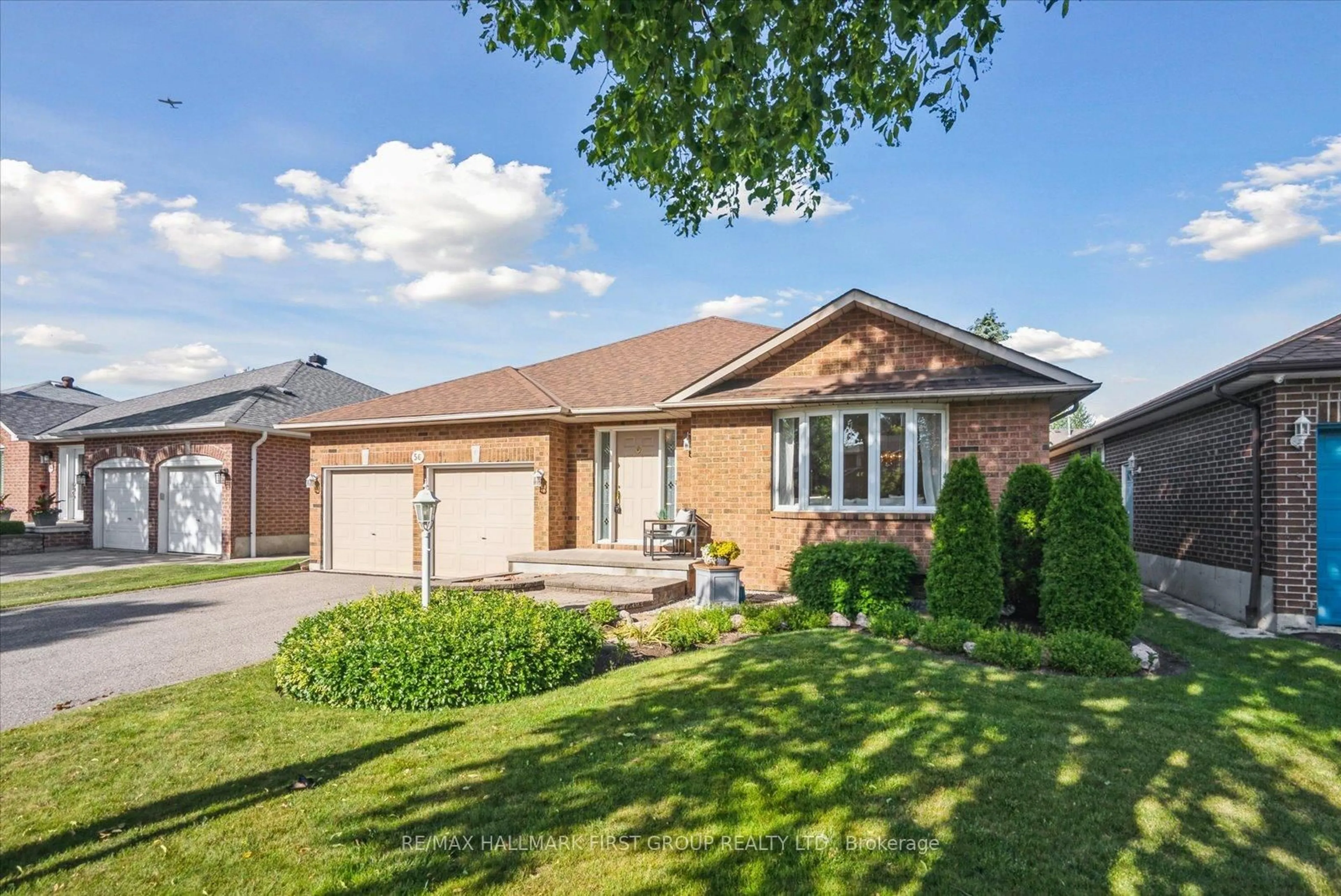 Home with brick exterior material, street for 56 Inglewood Pl, Whitby Ontario L1N 8Z9