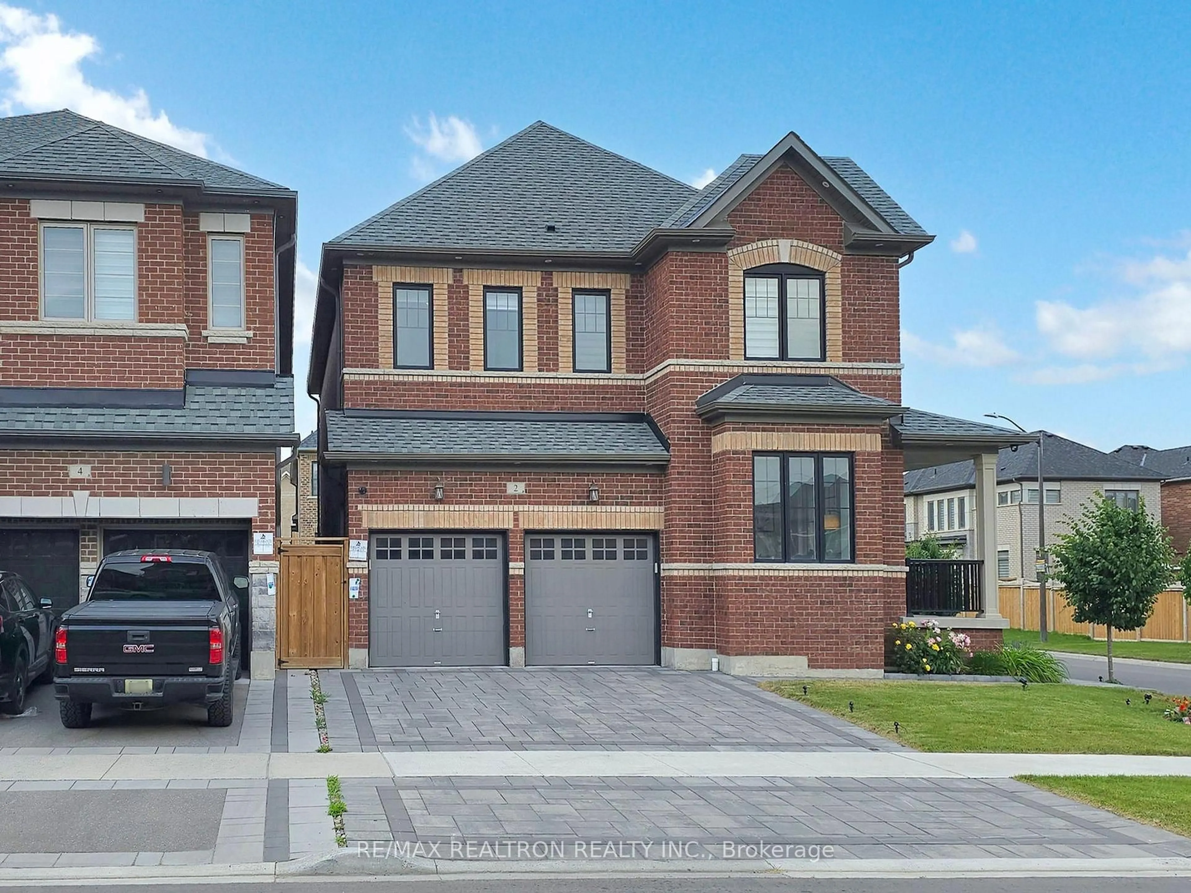 Home with brick exterior material, street for 2 Auckland Dr, Whitby Ontario L1P 0G6