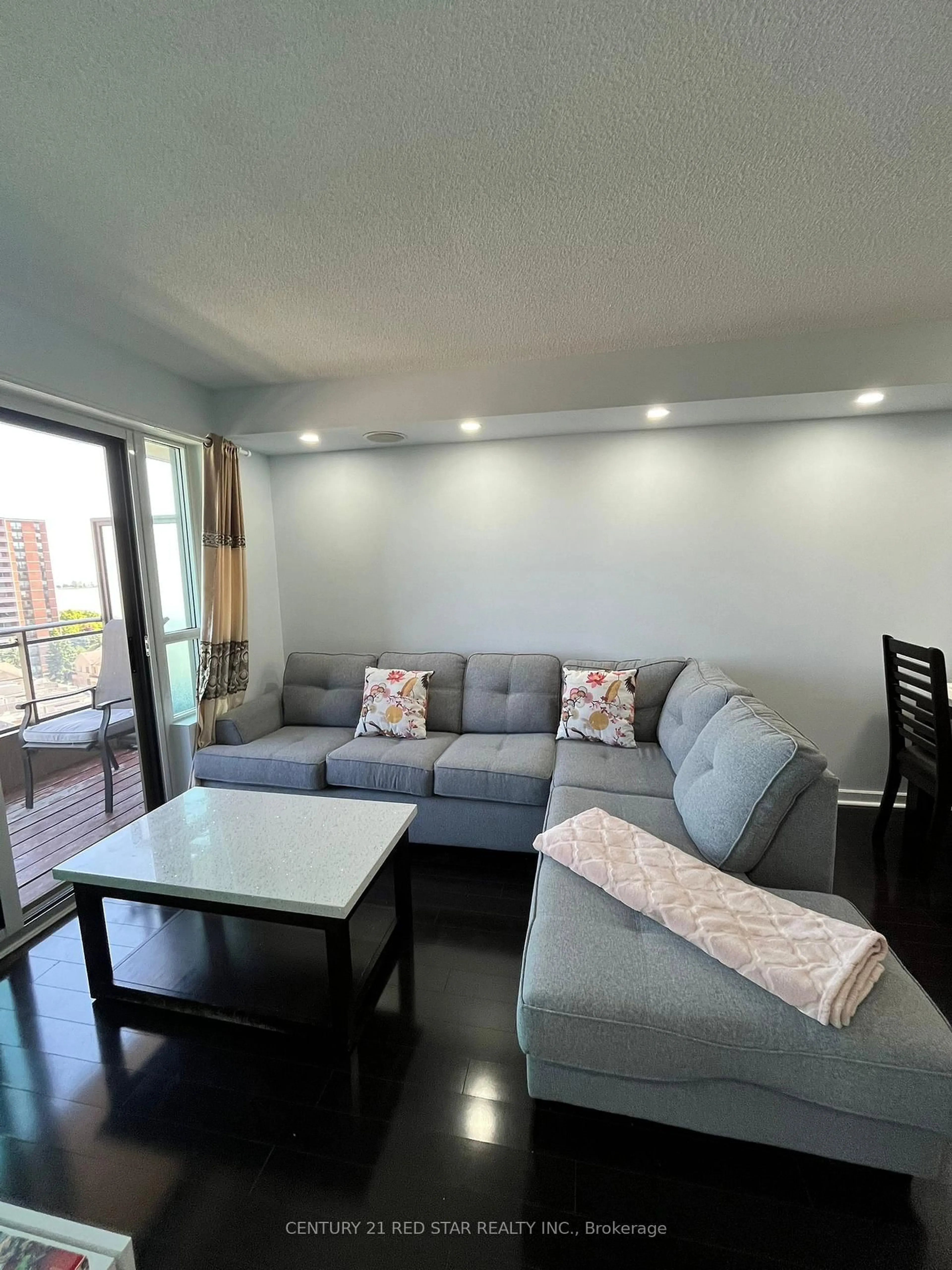 Living room with furniture, wood/laminate floor for 1235 Bayly St #1113, Pickering Ontario L1W 1L7