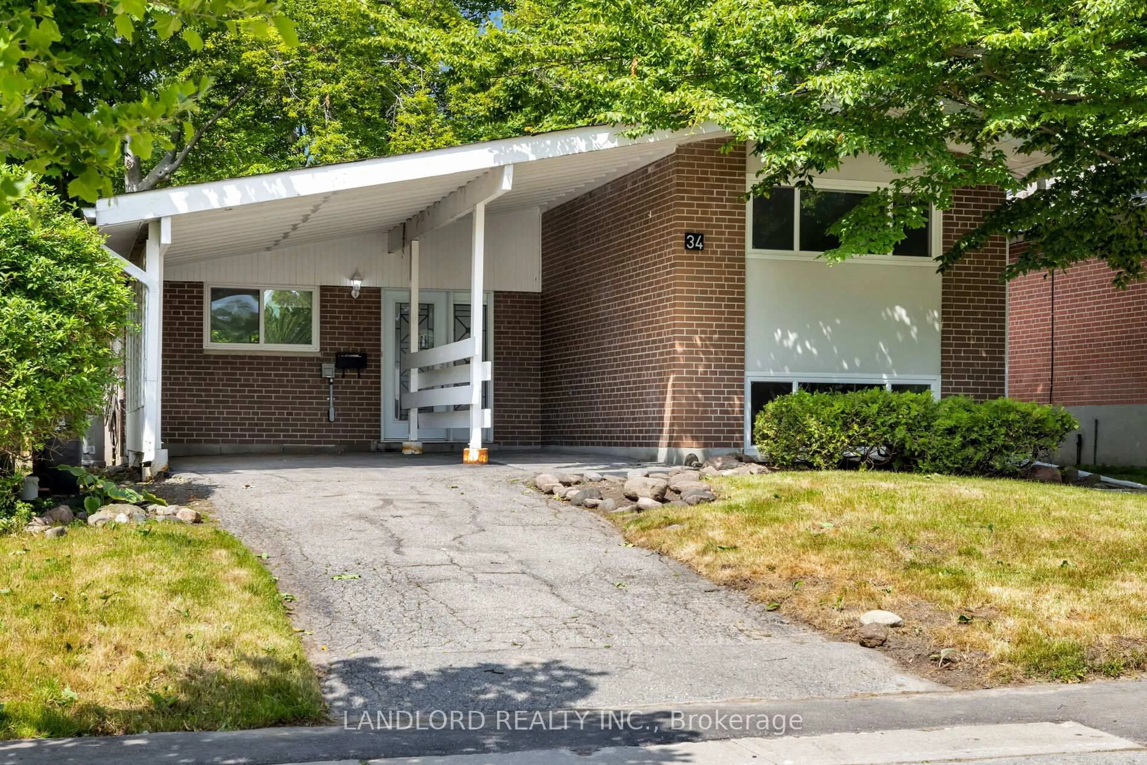 Home with vinyl exterior material, street for 34 Lyncroft Dr, Toronto Ontario M1E 1X7