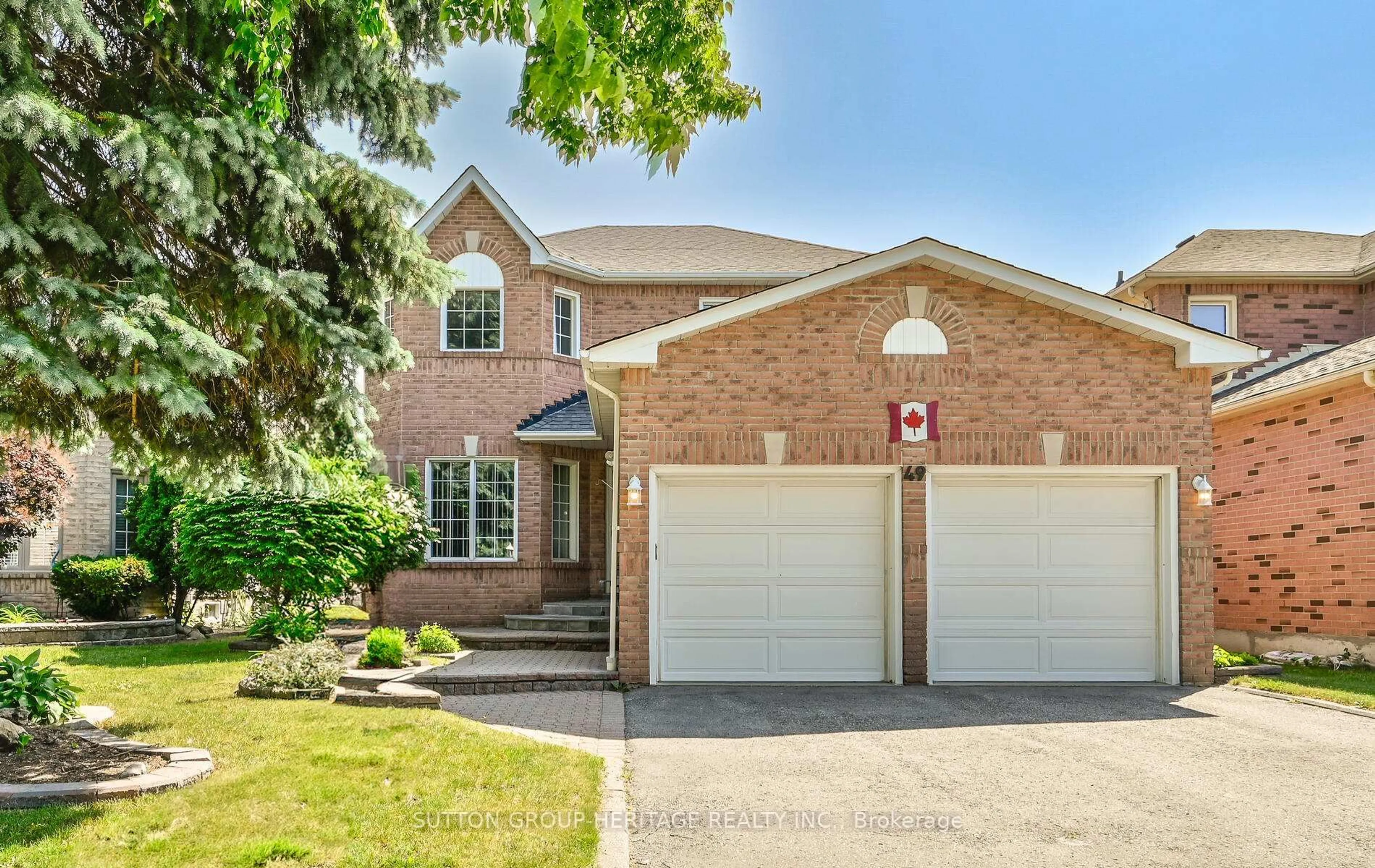 Home with brick exterior material, street for 49 Valleywood Dr, Whitby Ontario L1R 2J5
