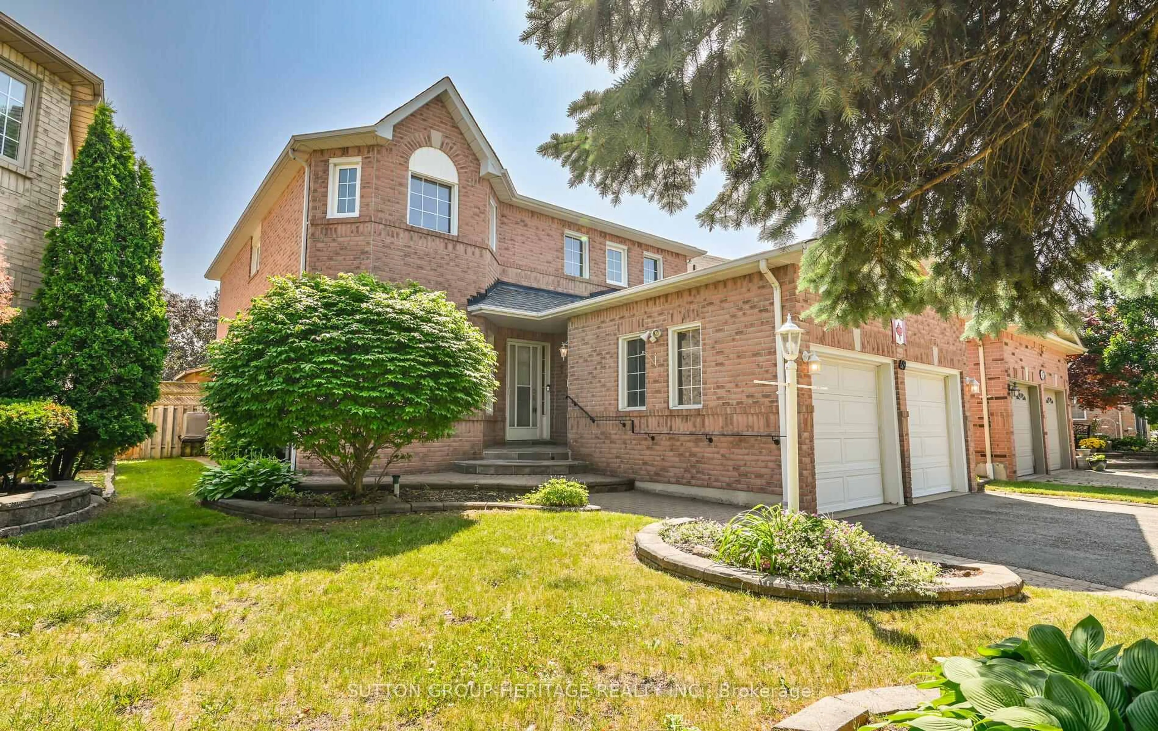 Home with brick exterior material, street for 49 Valleywood Dr, Whitby Ontario L1R 2J5