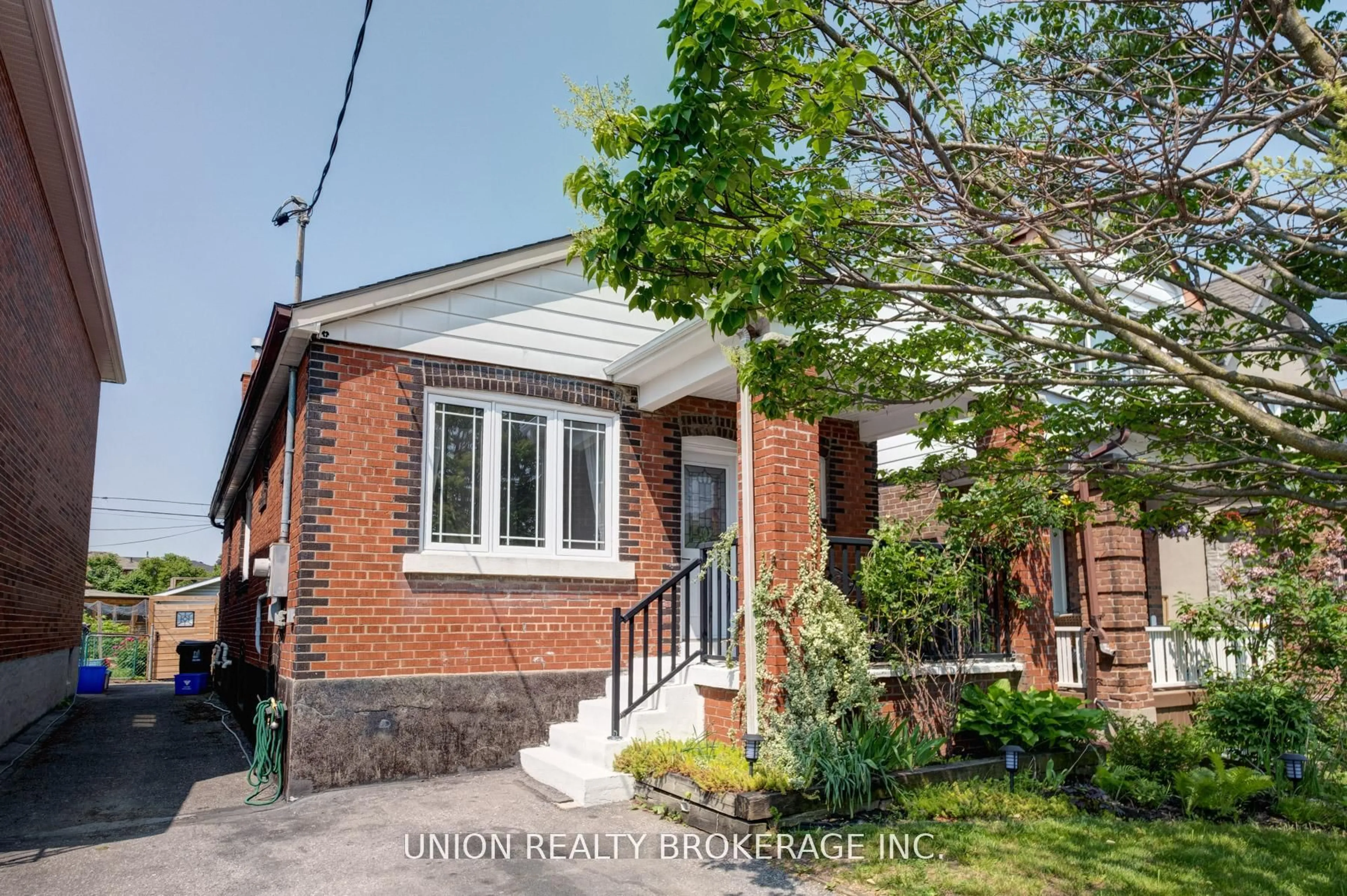 Home with brick exterior material, street for 316 Westlake Ave, Toronto Ontario M4C 4T9