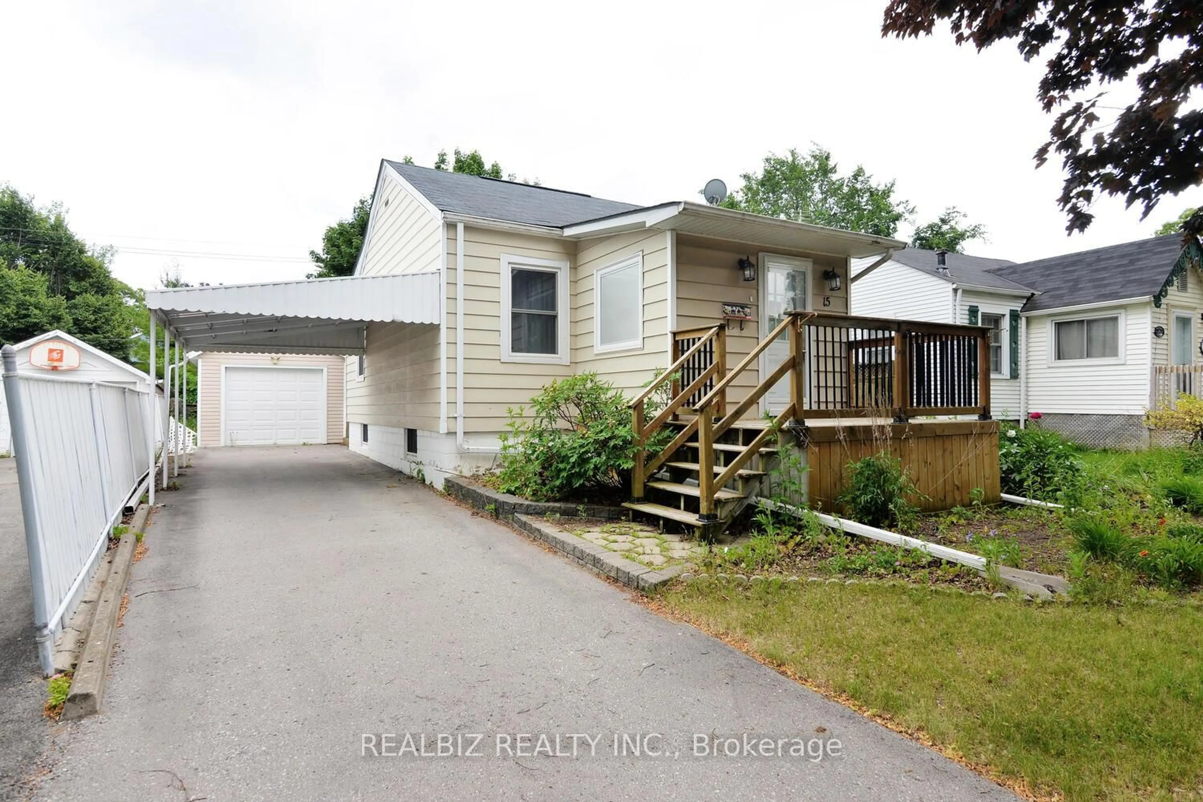Home with vinyl exterior material, street for 15 Oak St, Ajax Ontario L1S 1X7