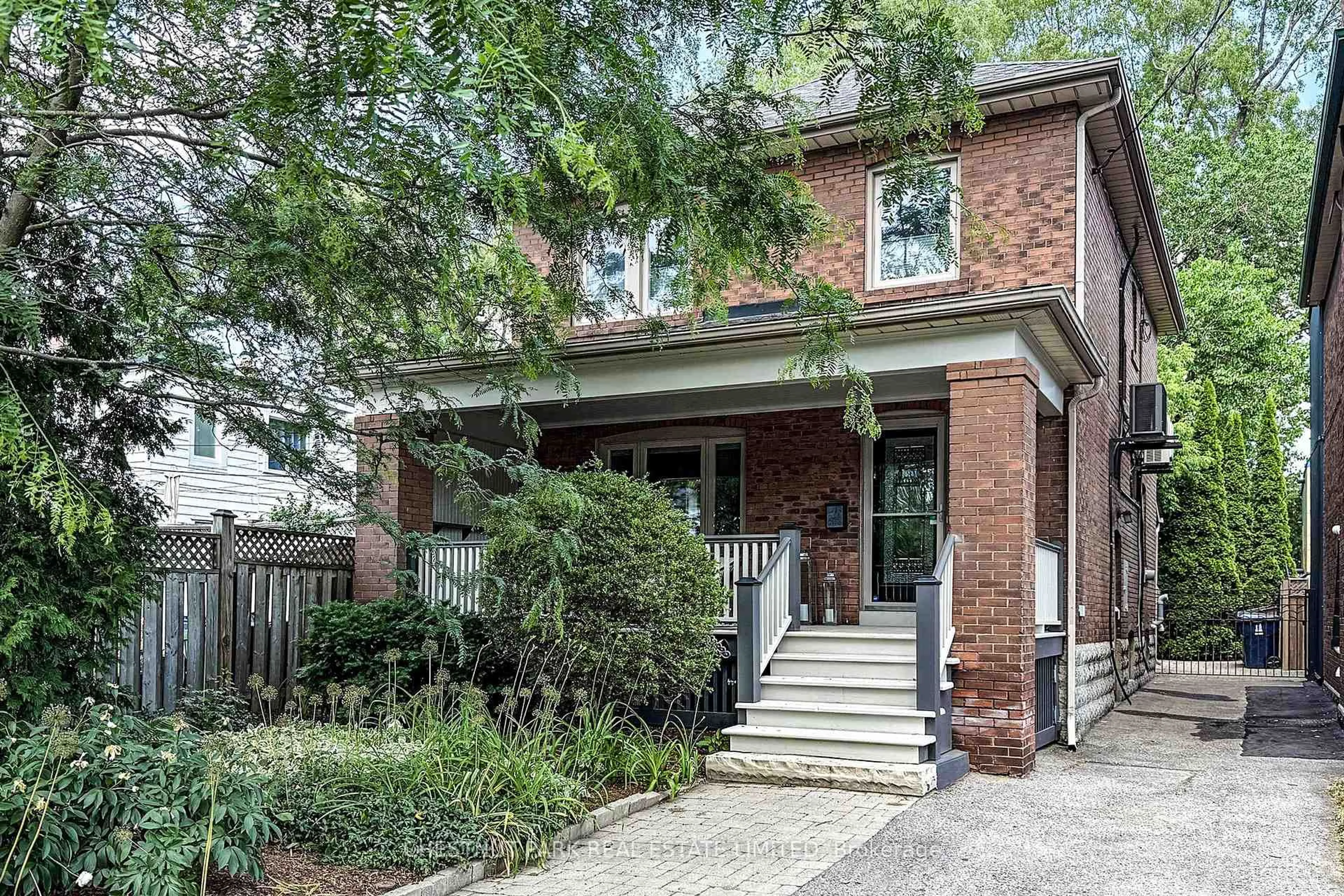 Home with brick exterior material, street for 1065 Logan Ave, Toronto Ontario M4K 3G2