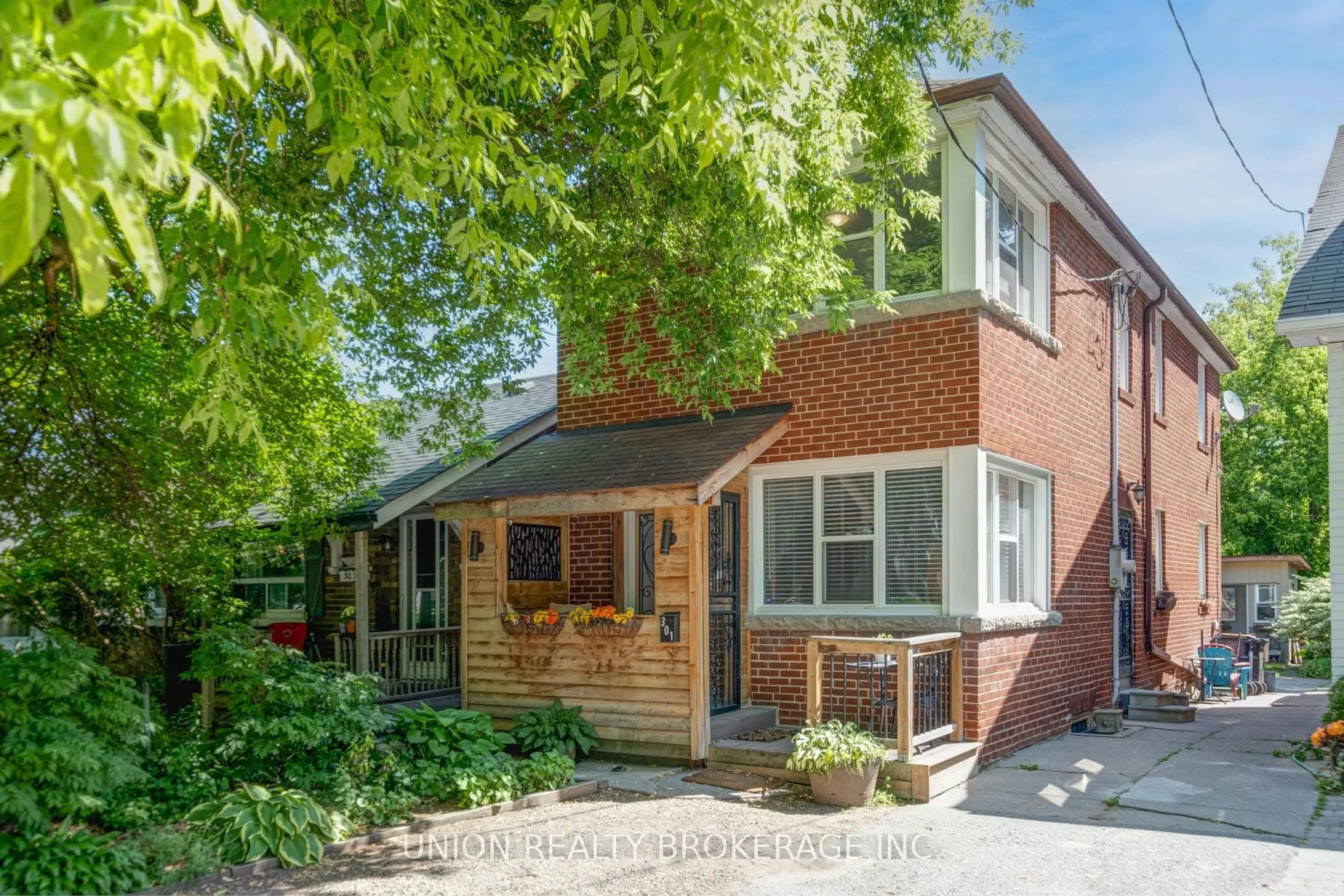 Home with brick exterior material, street for 301 Victoria Park Ave, Toronto Ontario M4E 3S7