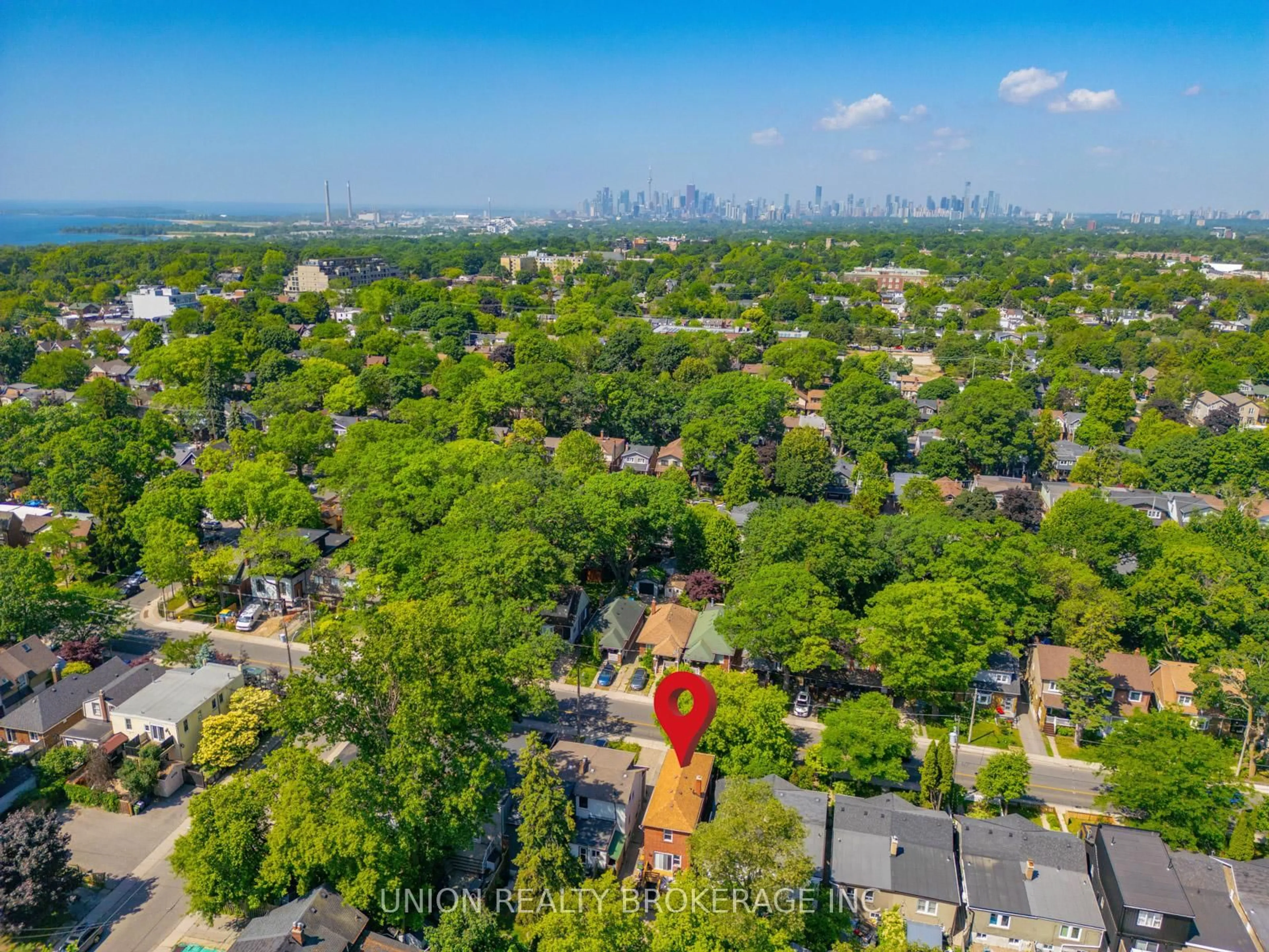 A pic from outside/outdoor area/front of a property/back of a property/a pic from drone, city buildings view from balcony for 301 Victoria Park Ave, Toronto Ontario M4E 3S7