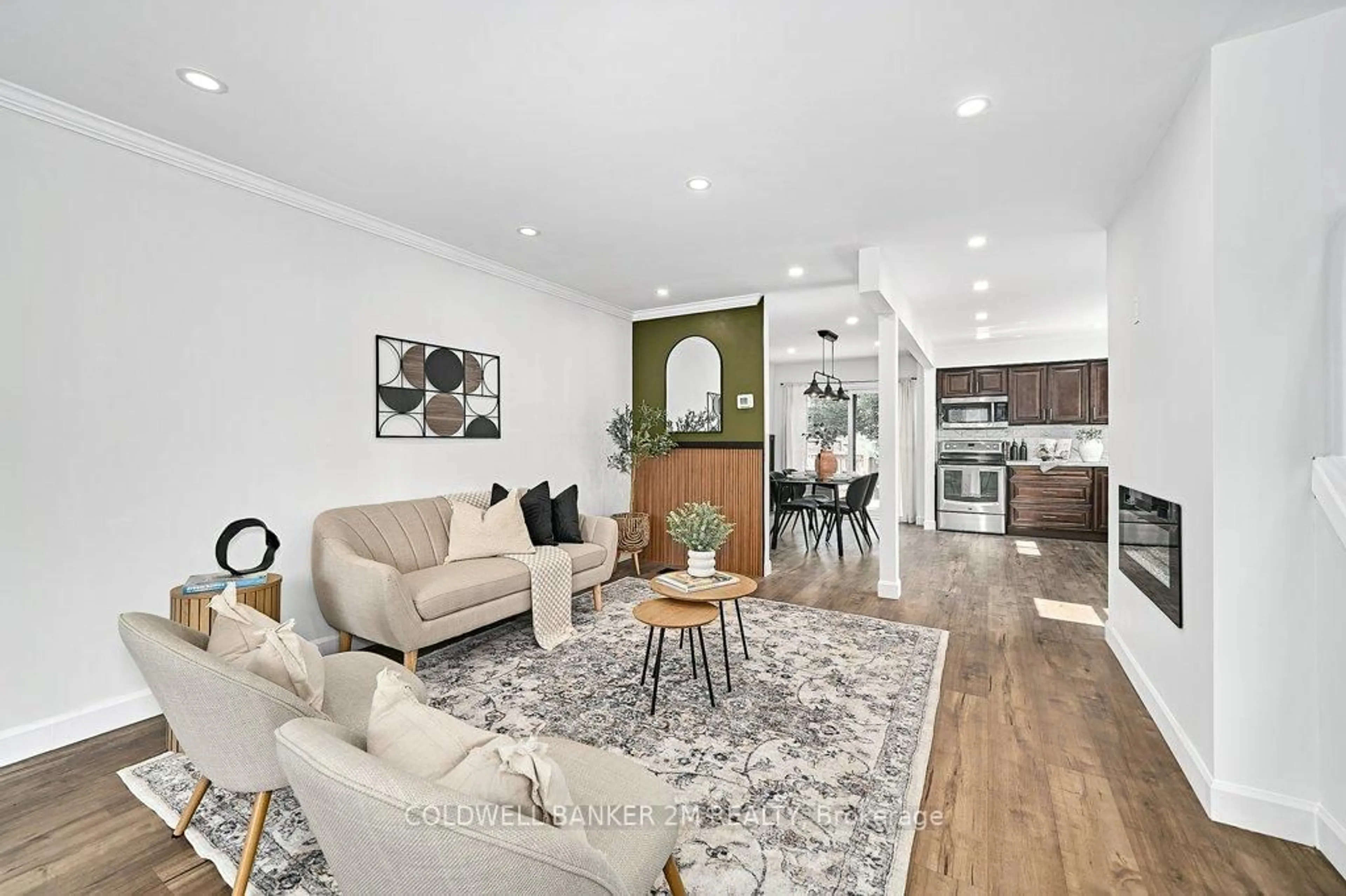 Living room with furniture, wood/laminate floor for 357 Pompano Crt, Oshawa Ontario L1K 1M9