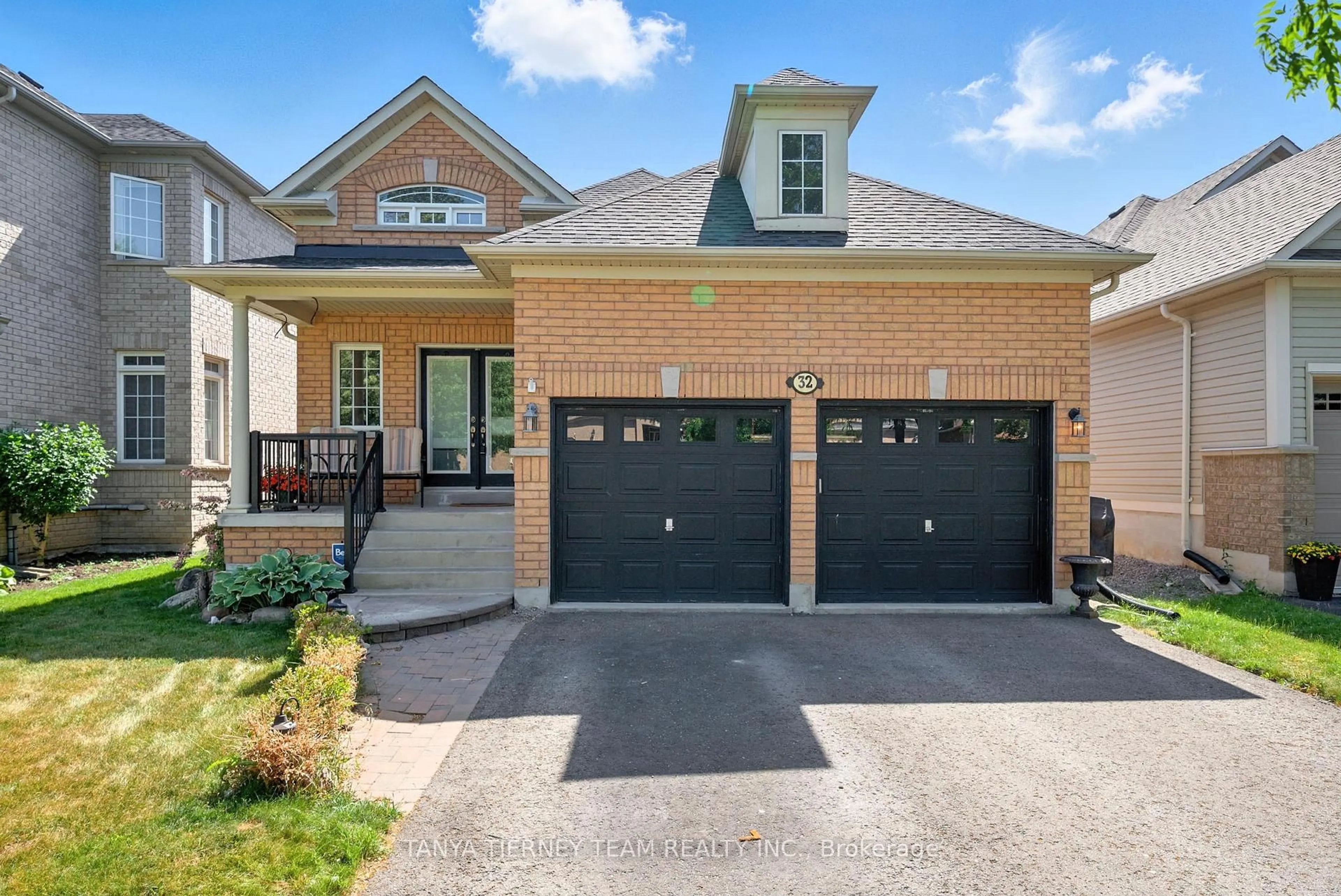 Home with brick exterior material, street for 32 Alfred Shrubb Lane, Clarington Ontario L1C 0B2