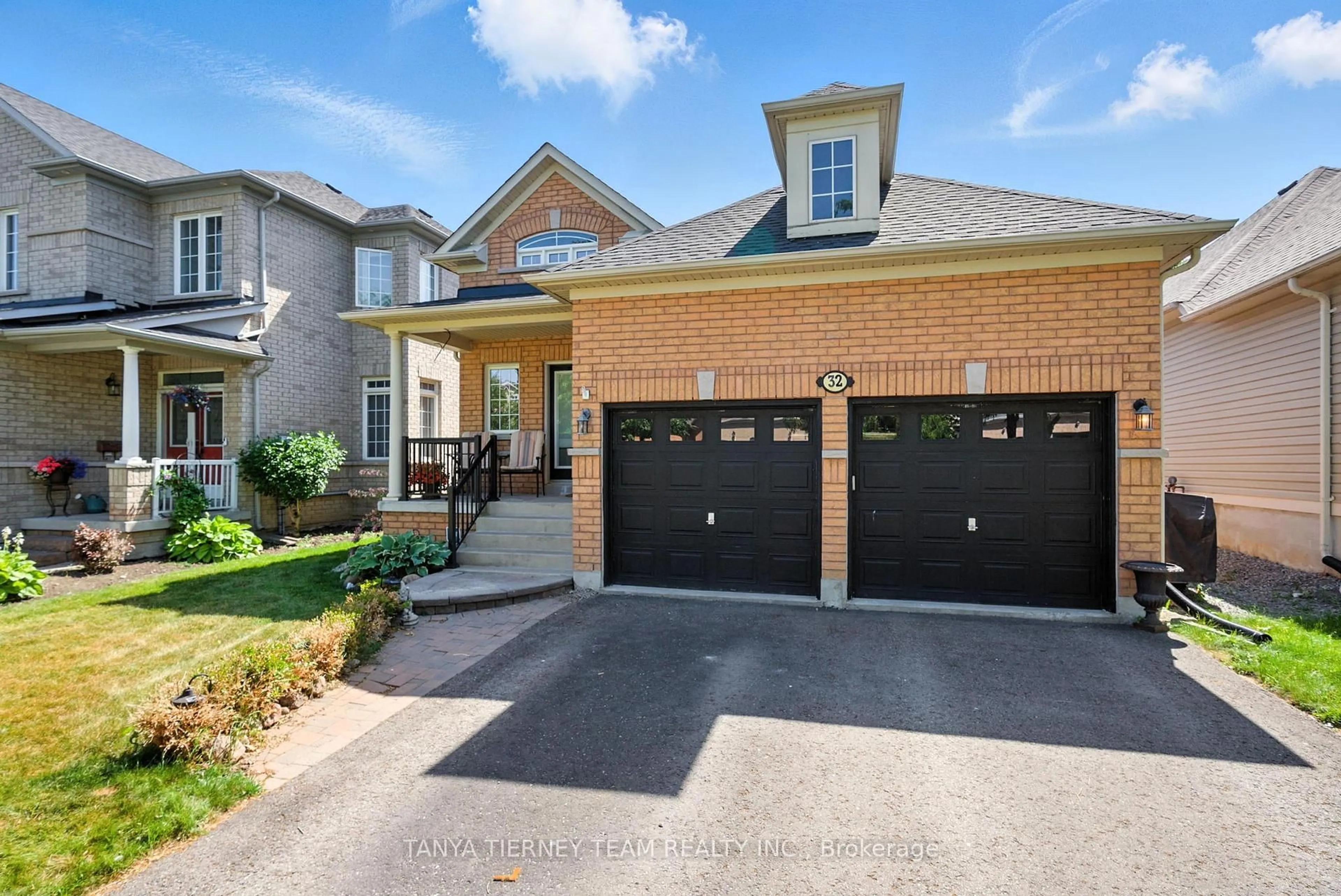 Home with brick exterior material, street for 32 Alfred Shrubb Lane, Clarington Ontario L1C 0B2