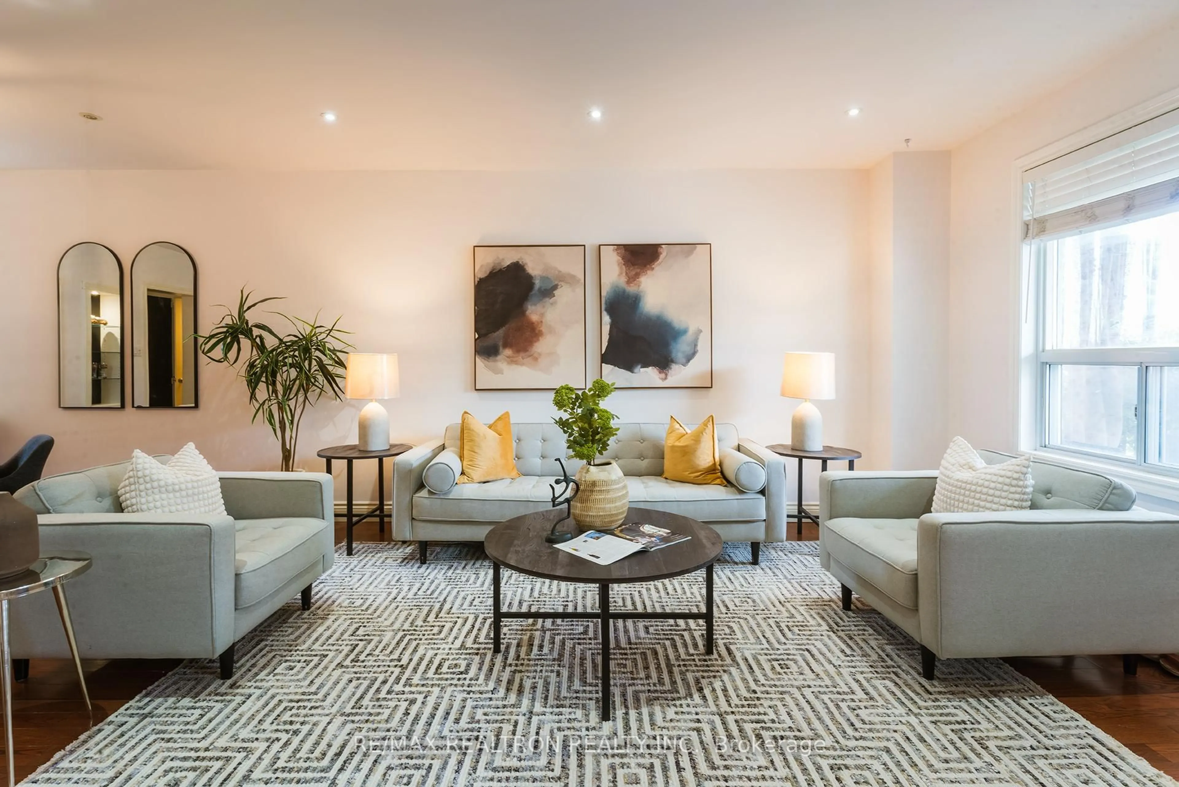 Living room with furniture, carpet floor for 569 Greenwood Ave, Toronto Ontario M4J 4A8