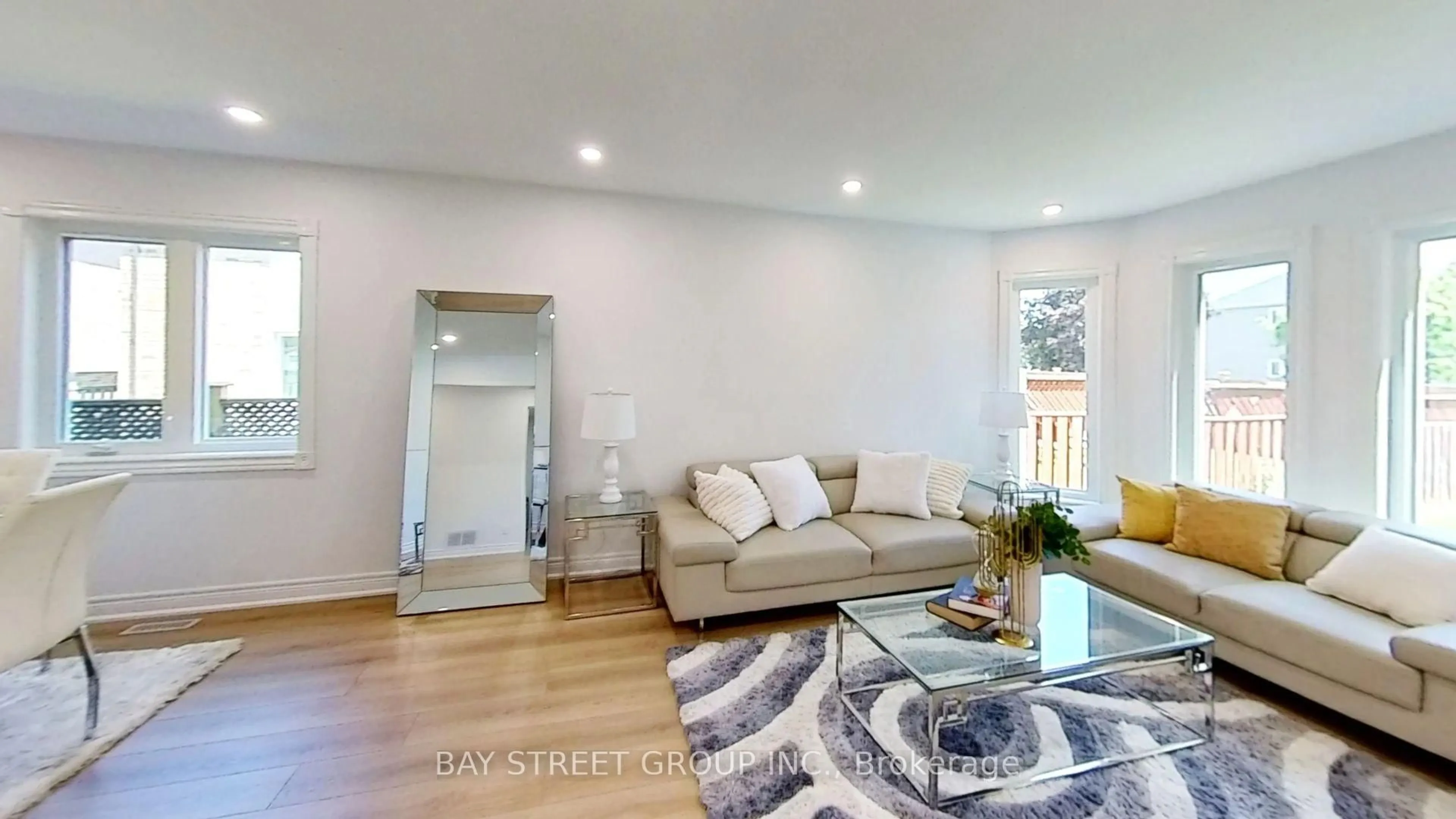 Living room with furniture, wood/laminate floor for 6 Bonnydon Cres, Toronto Ontario M1B 5X3