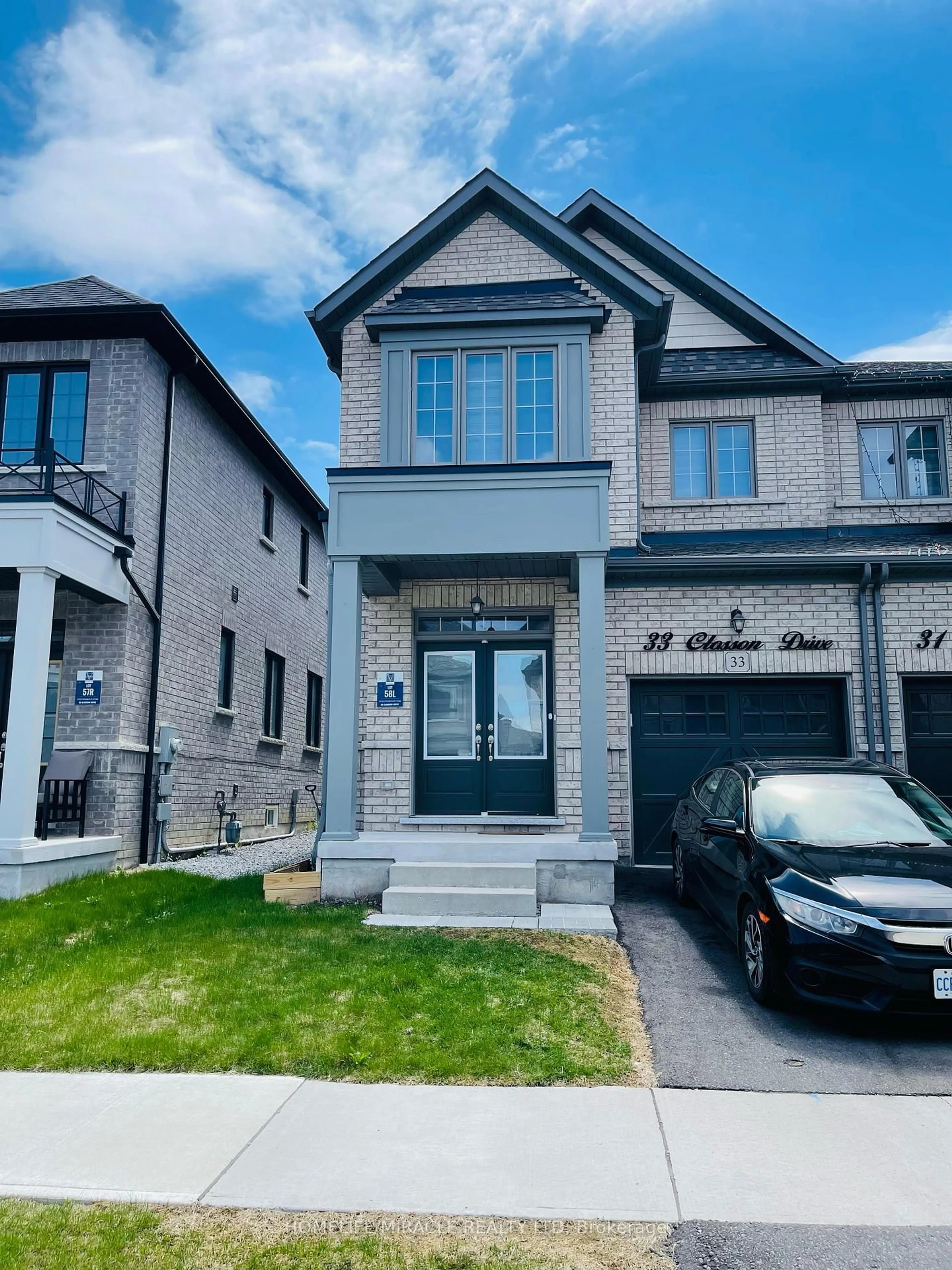 Home with brick exterior material, street for 33 Closson Dr, Whitby Ontario L1P 0M9