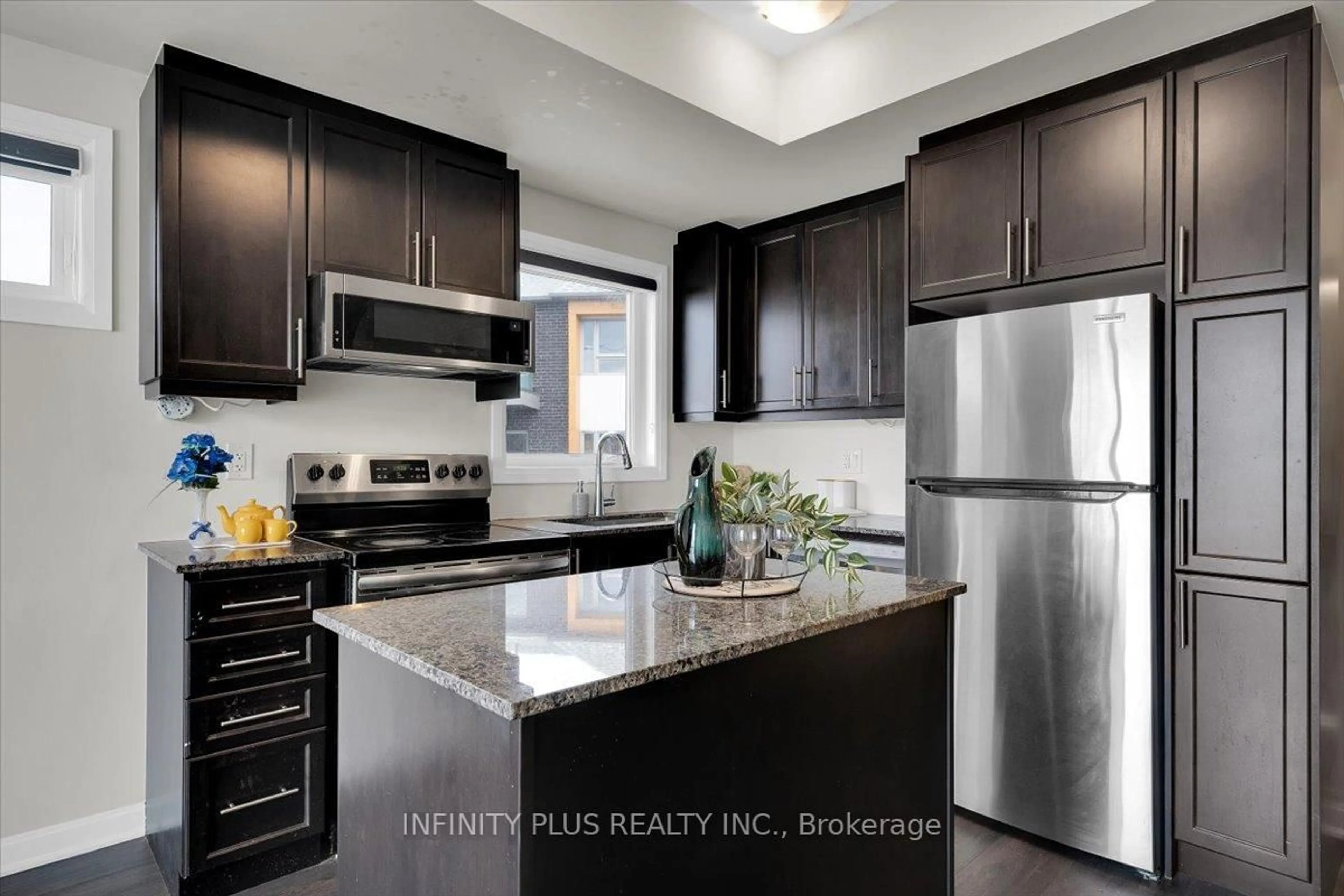 Open concept kitchen, unknown for 1085 Danforth Rd #202, Toronto Ontario M1J 0B2