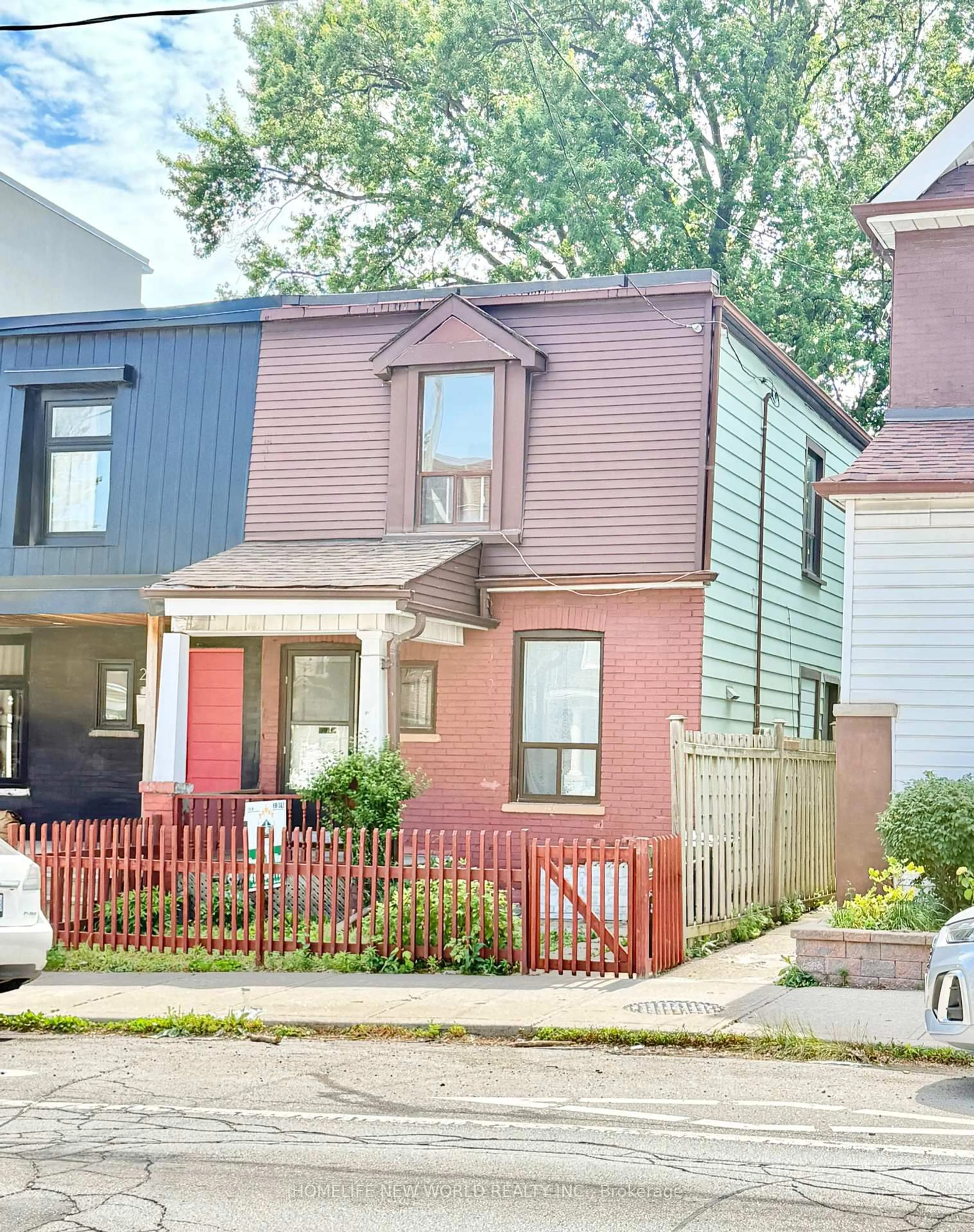 Home with brick exterior material, street for 288 Jones Ave, Toronto Ontario M4M 3A6