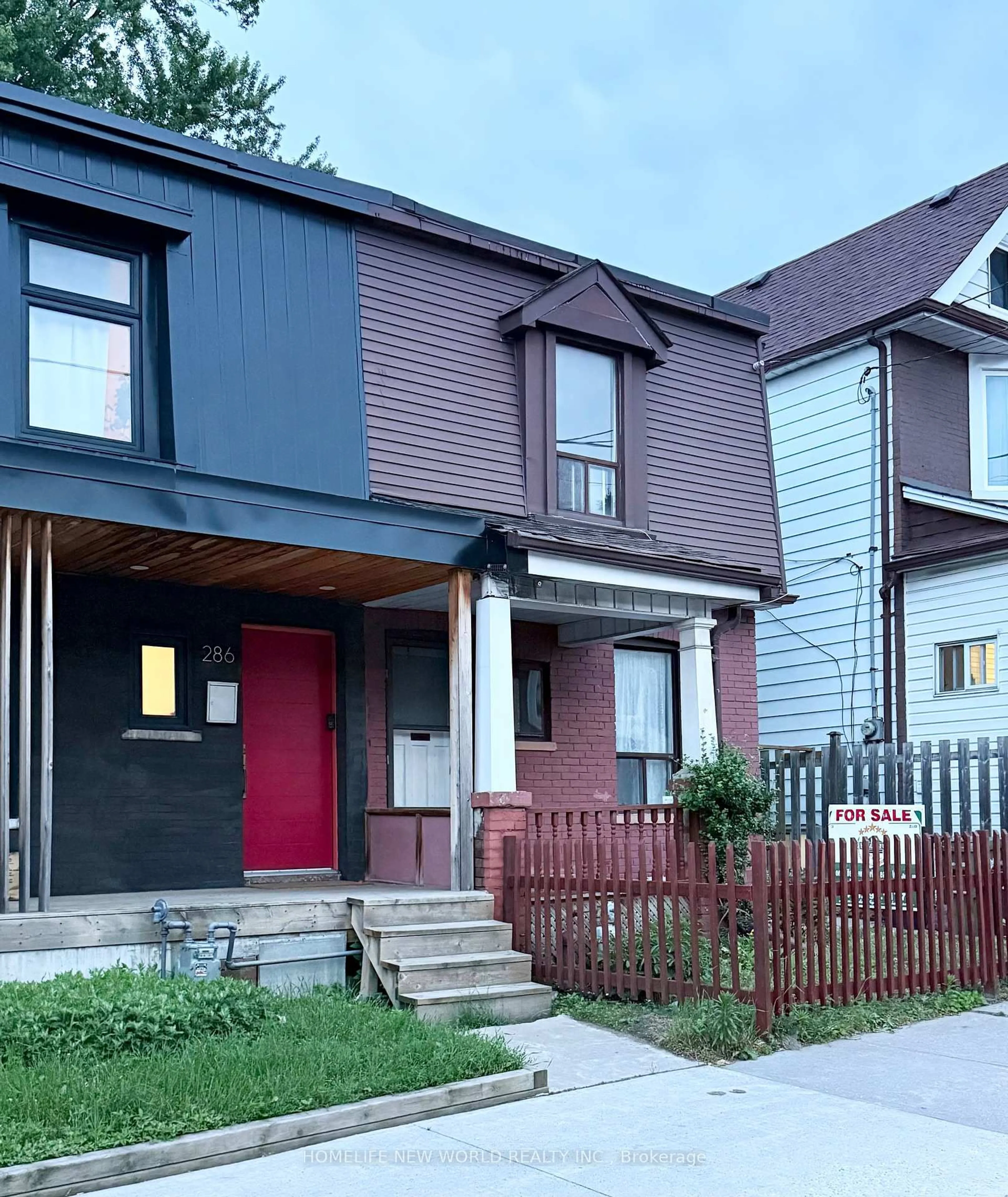 Home with vinyl exterior material, street for 288 Jones Ave, Toronto Ontario M4M 3A6