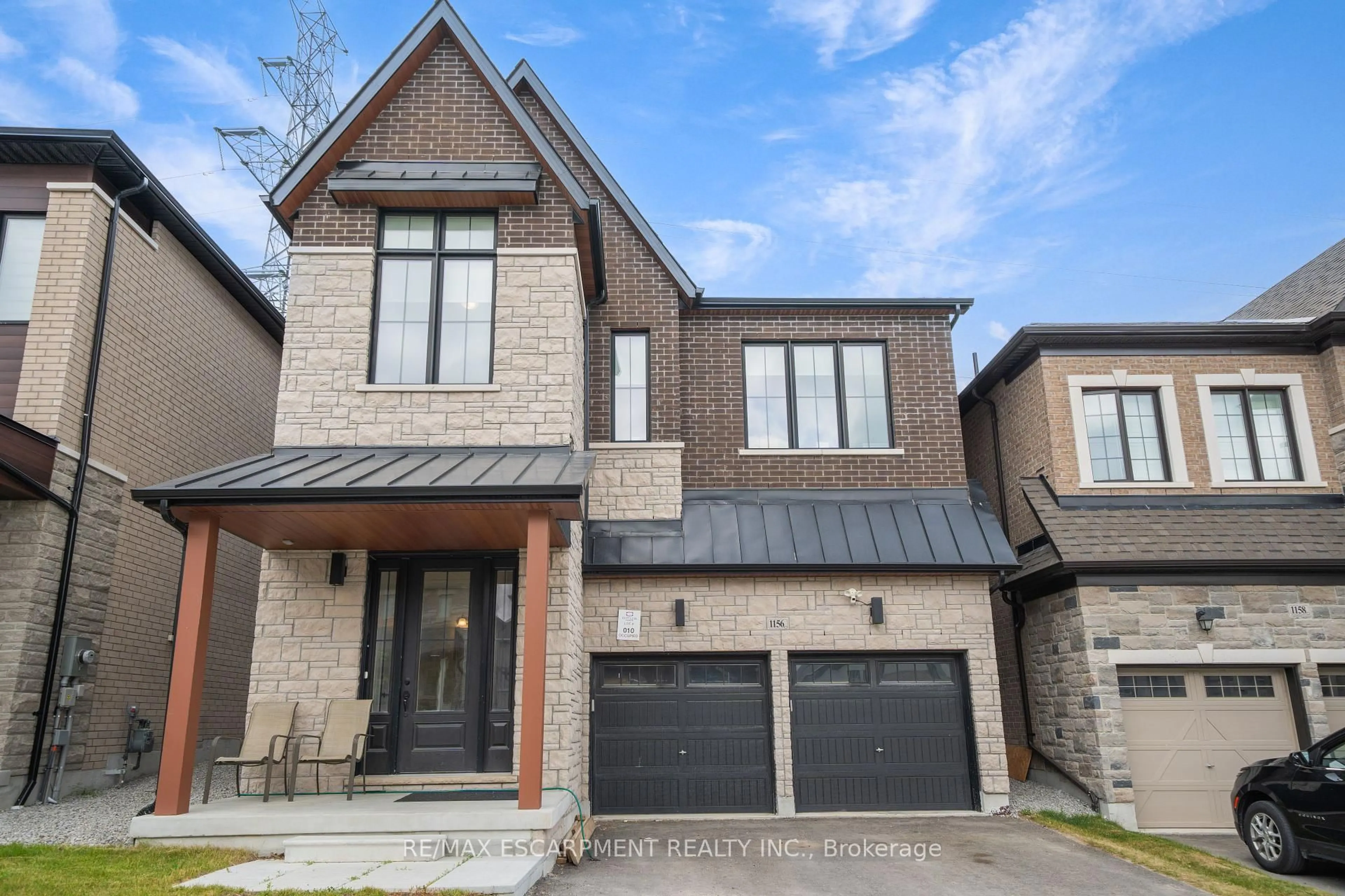 Home with brick exterior material, street for 1156 Skyridge Blvd, Pickering Ontario L1X 0M4