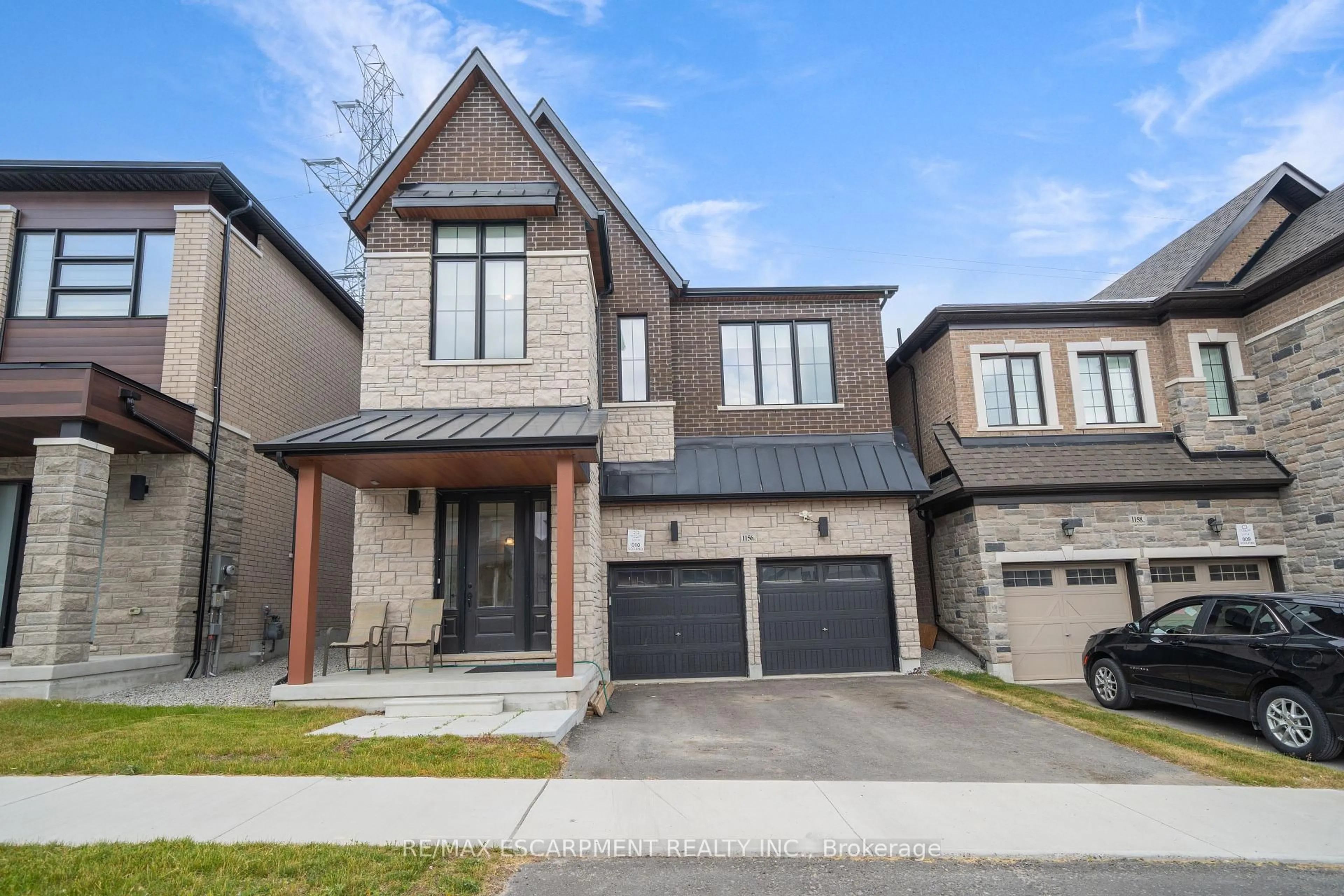 Home with brick exterior material, street for 1156 Skyridge Blvd, Pickering Ontario L1X 0M4