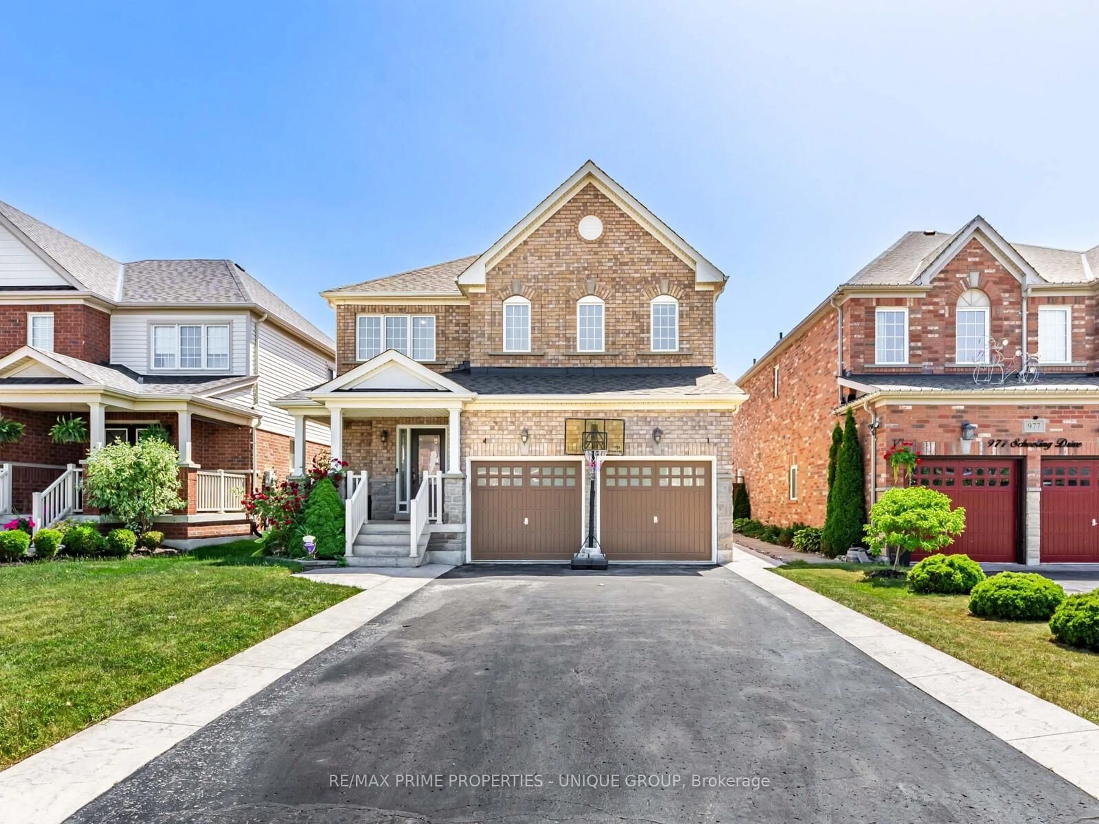 Home with brick exterior material, street for 981 Schooling Dr, Oshawa Ontario L1K 0J9