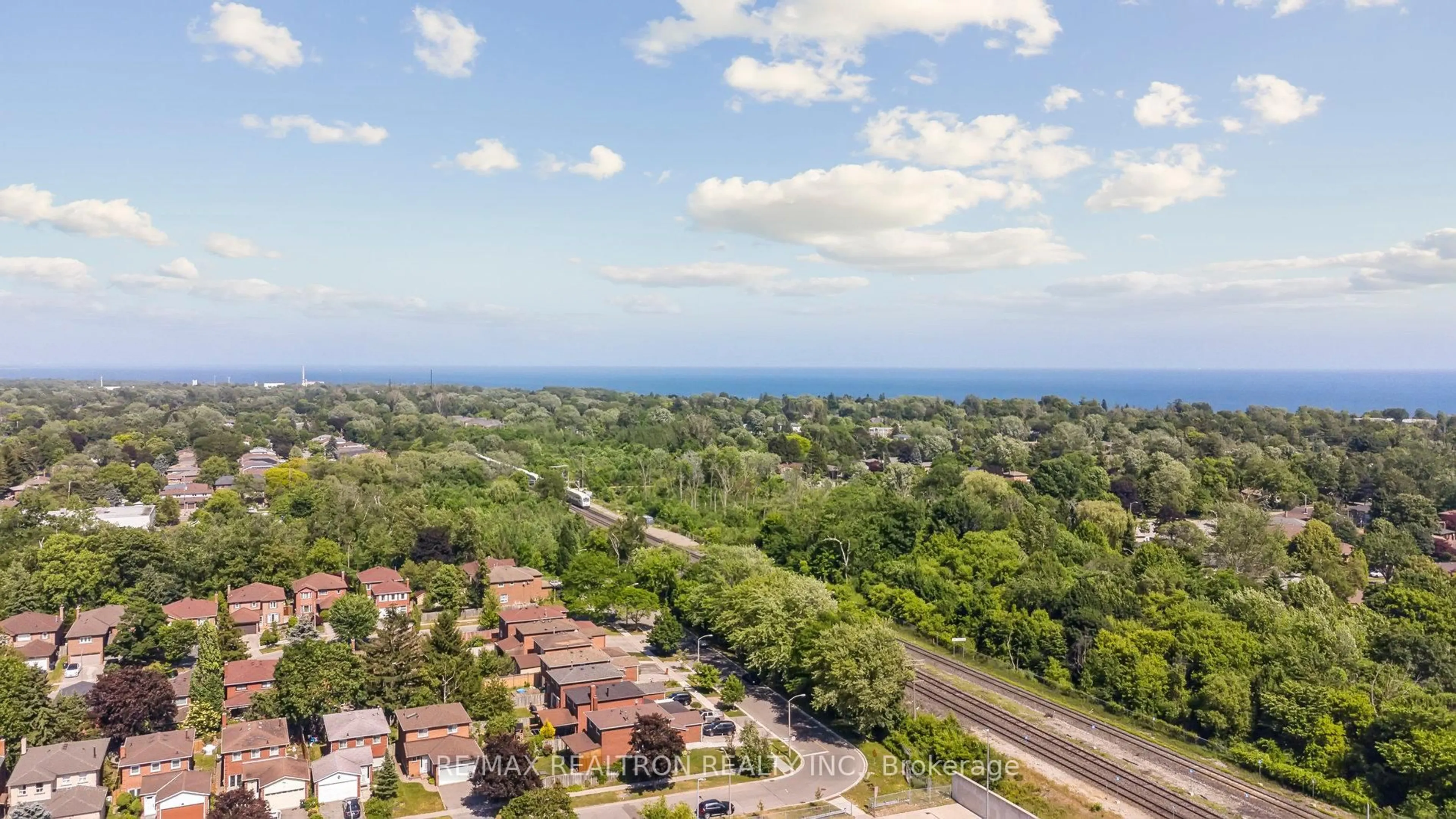 A pic from outside/outdoor area/front of a property/back of a property/a pic from drone, water/lake/river/ocean view for 145 Homestead Rd, Toronto Ontario M1E 3S1