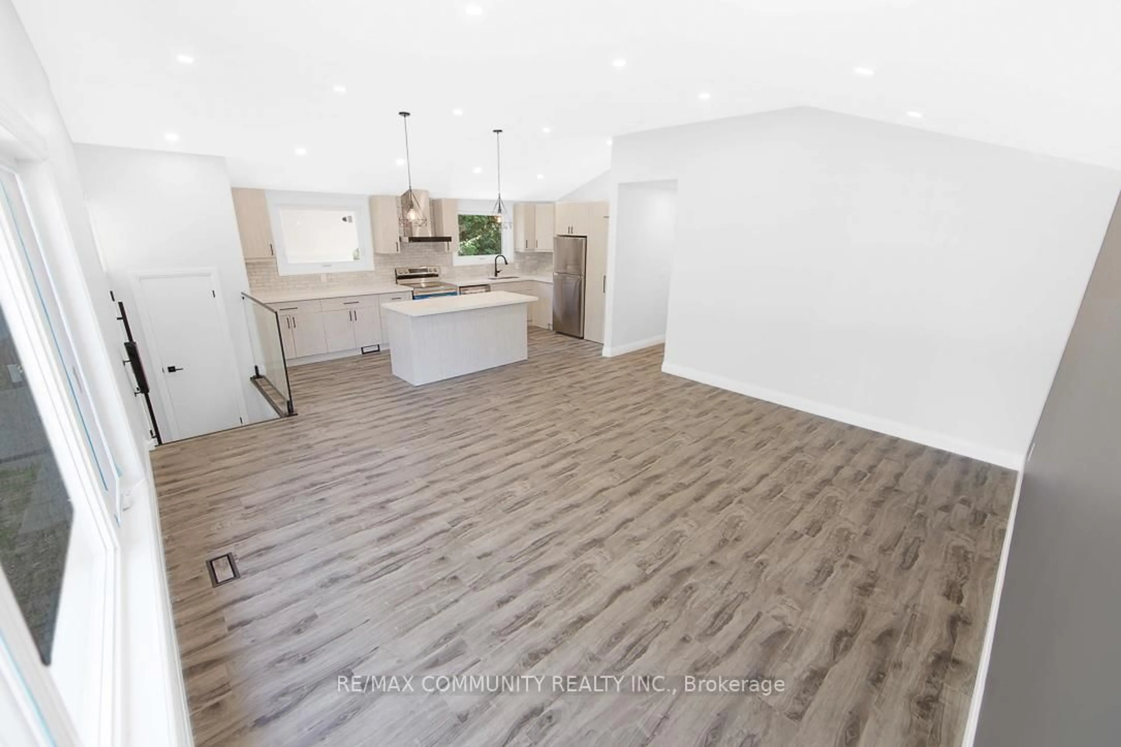 Open concept kitchen, wood/laminate floor for 13750 Old Simcoe Rd, Scugog Ontario L9L 1C1