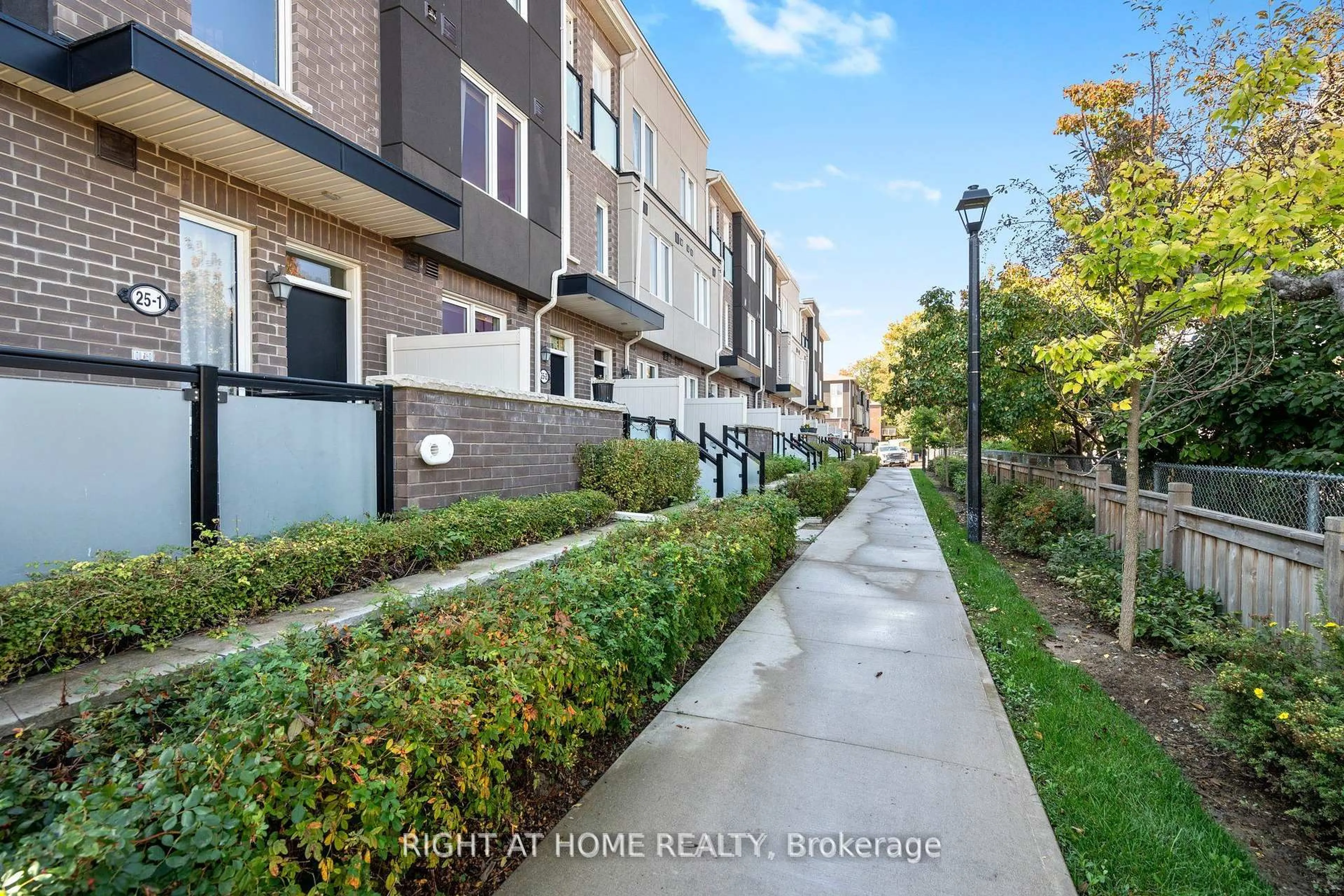 A pic from outside/outdoor area/front of a property/back of a property/a pic from drone, street for 25 Heron Park Pl #4, Toronto Ontario M1E 0B8