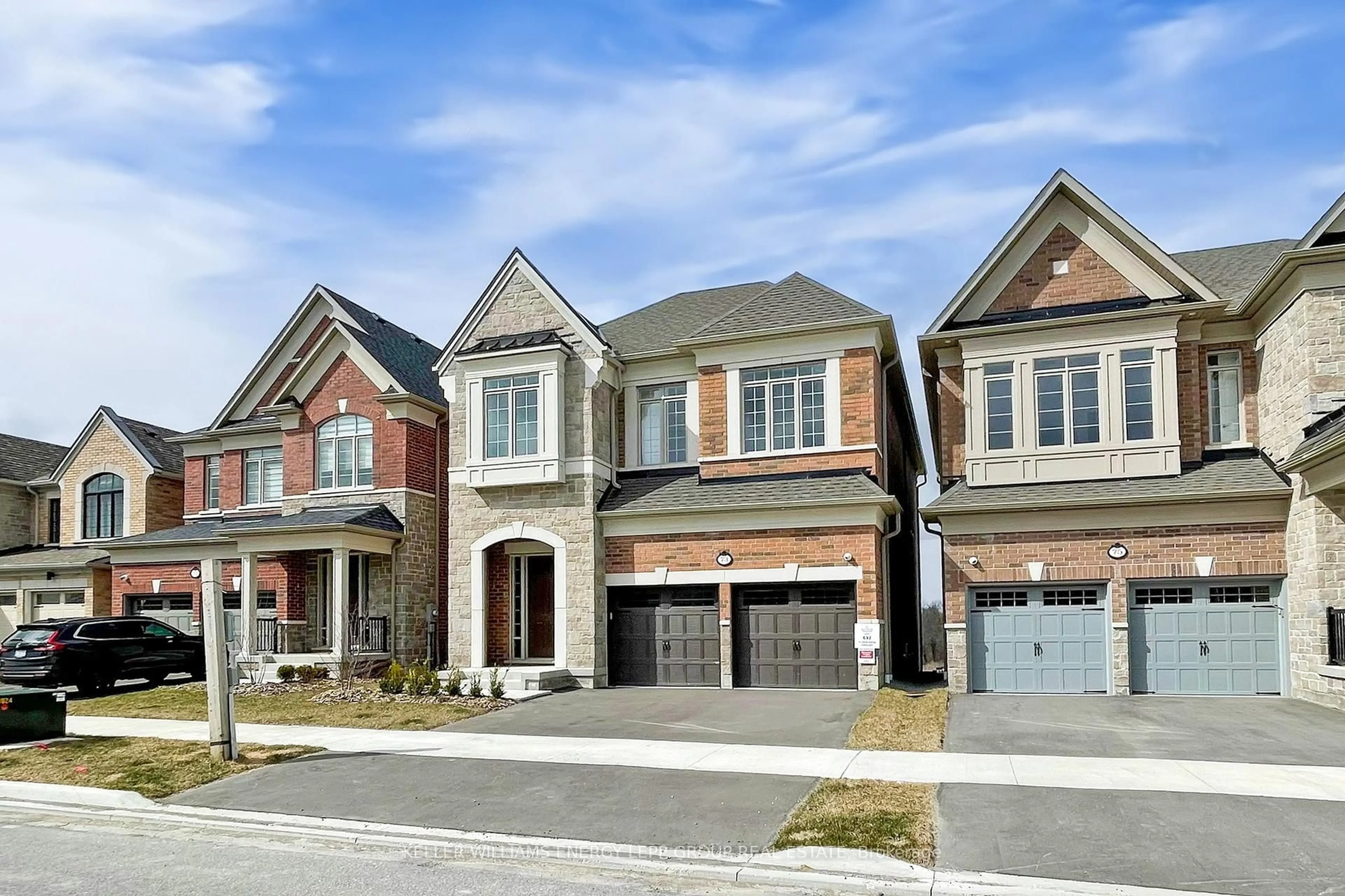 Home with brick exterior material, street for 73 Deer Ridge Cres, Whitby Ontario L1P 0P2