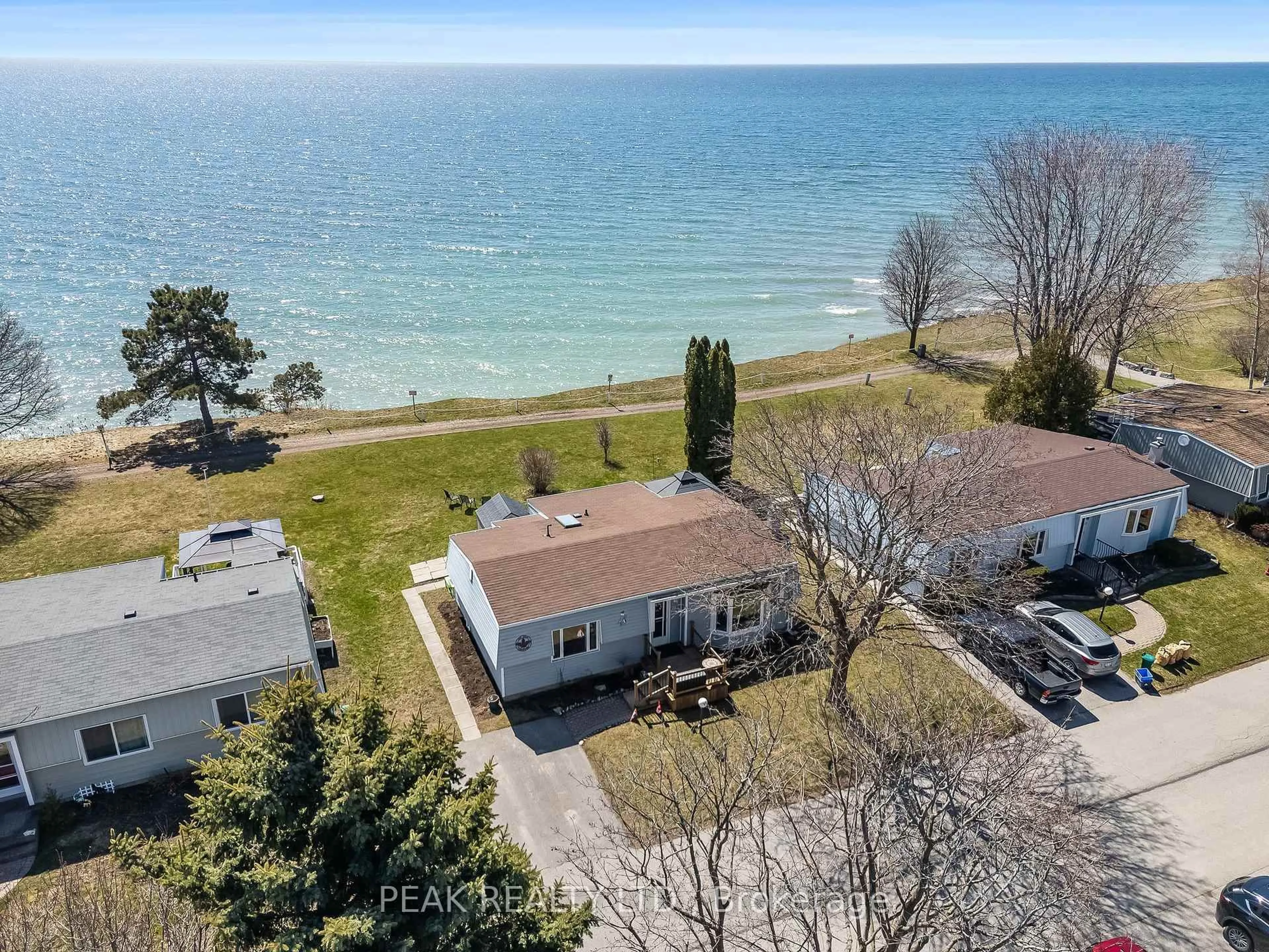 A pic from outside/outdoor area/front of a property/back of a property/a pic from drone, water/lake/river/ocean view for 71 Bluffs Rd, Clarington Ontario L1B 1A6