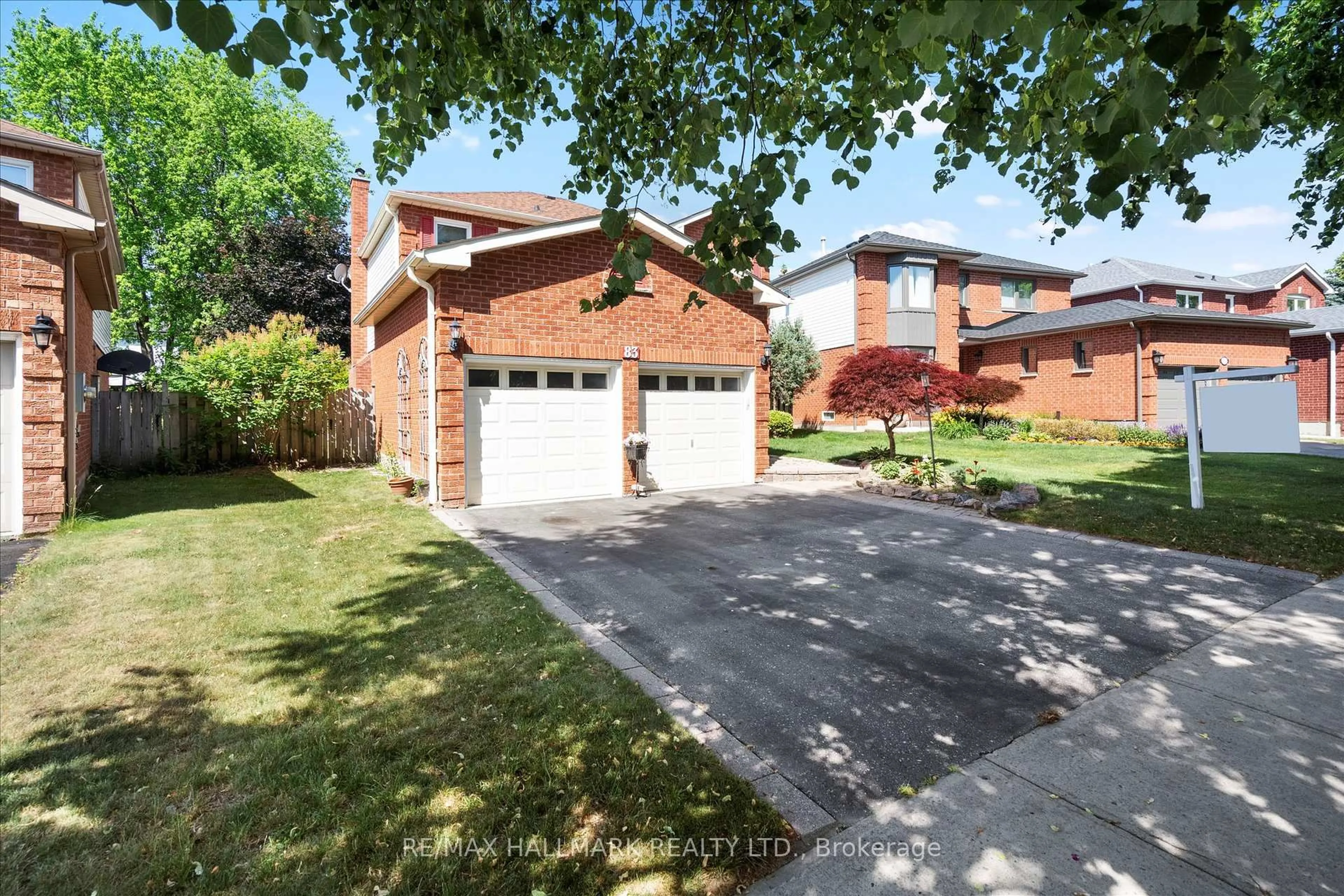 Home with brick exterior material, street for 83 Lipton Cres, Whitby Ontario L1R 1W9