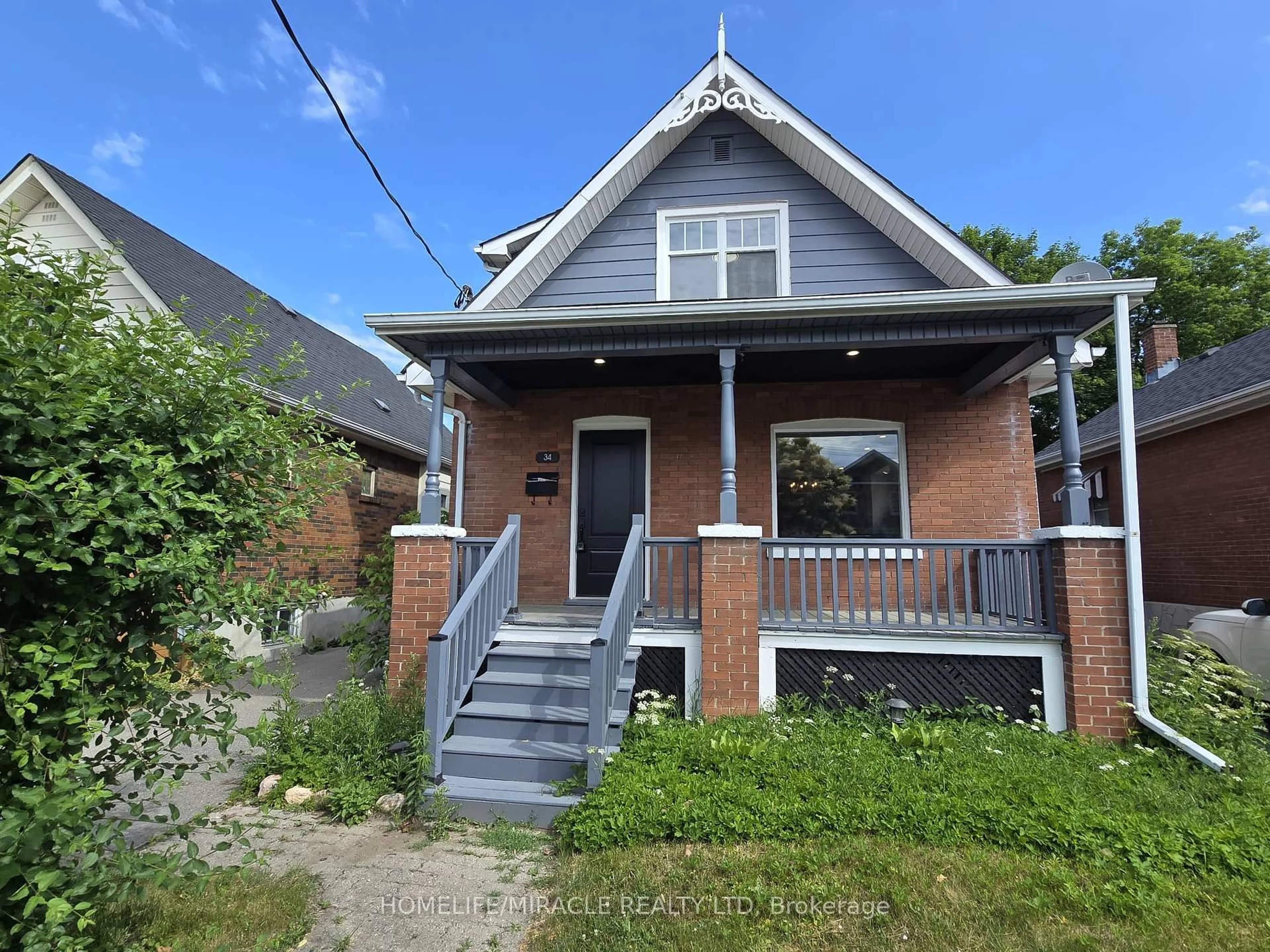 Home with brick exterior material, street for 34 Westmoreland Ave, Oshawa Ontario L1G 2M8