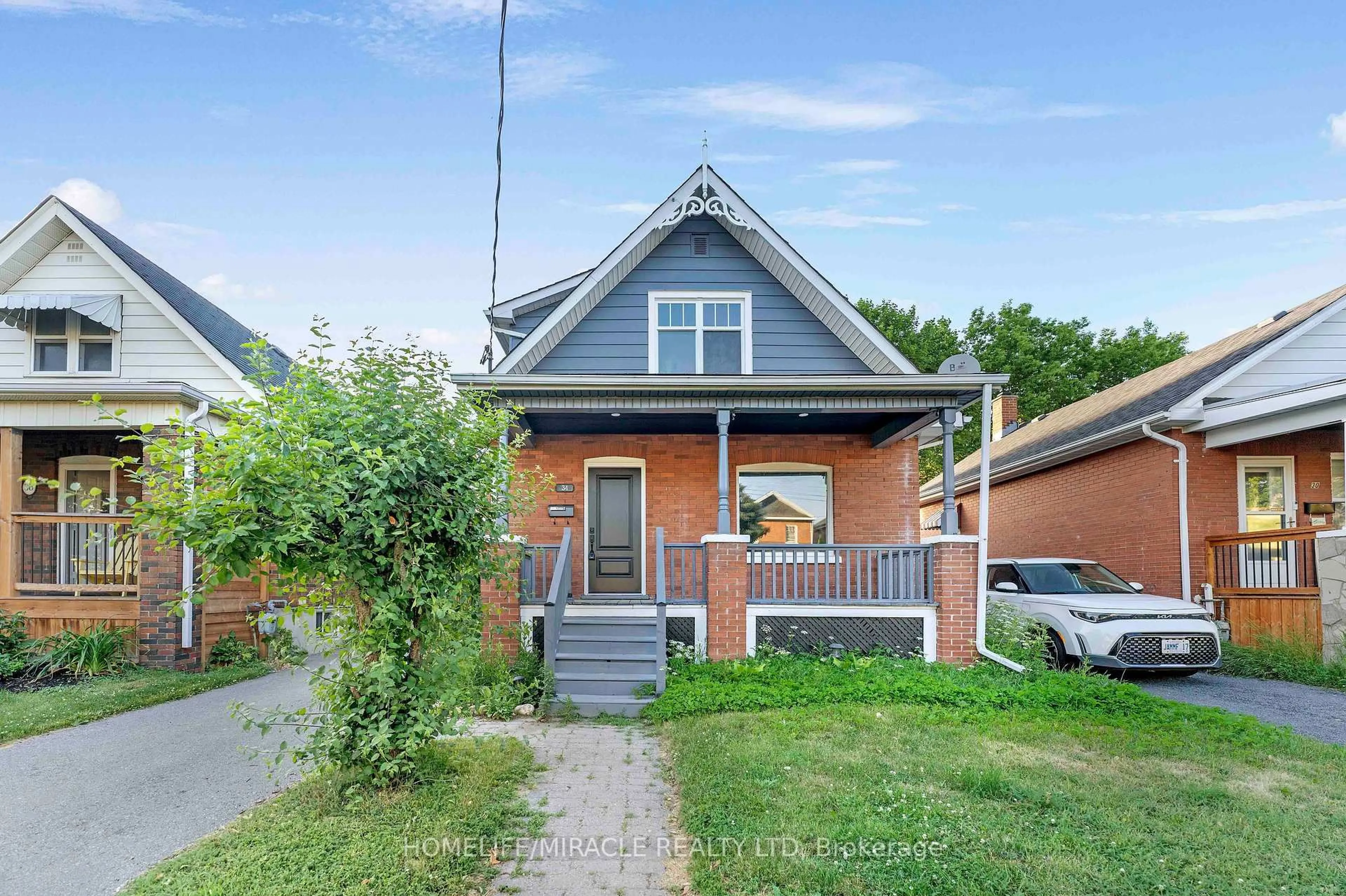 Home with brick exterior material, street for 34 Westmoreland Ave, Oshawa Ontario L1G 2M8