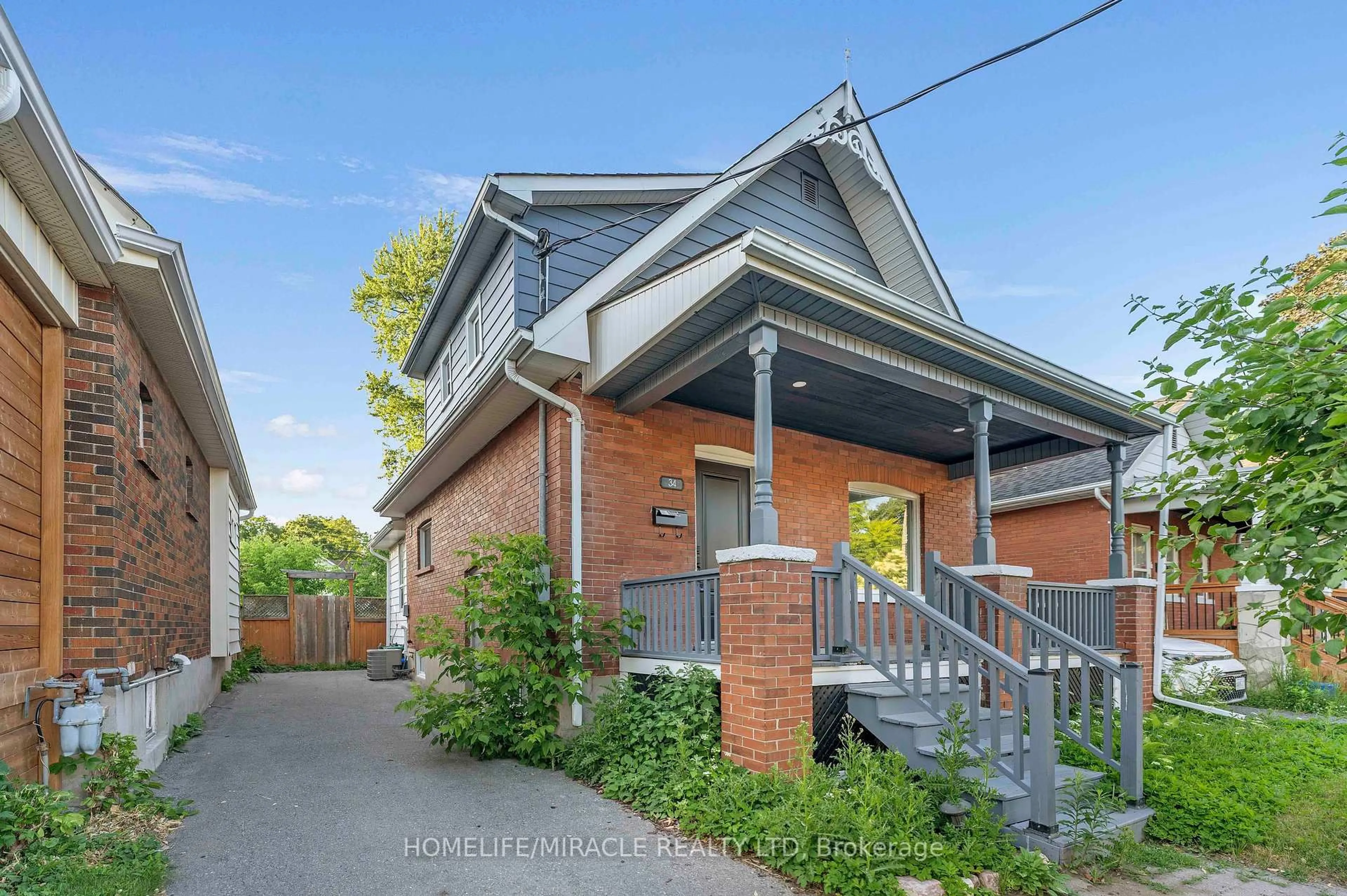 Home with brick exterior material, street for 34 Westmoreland Ave, Oshawa Ontario L1G 2M8