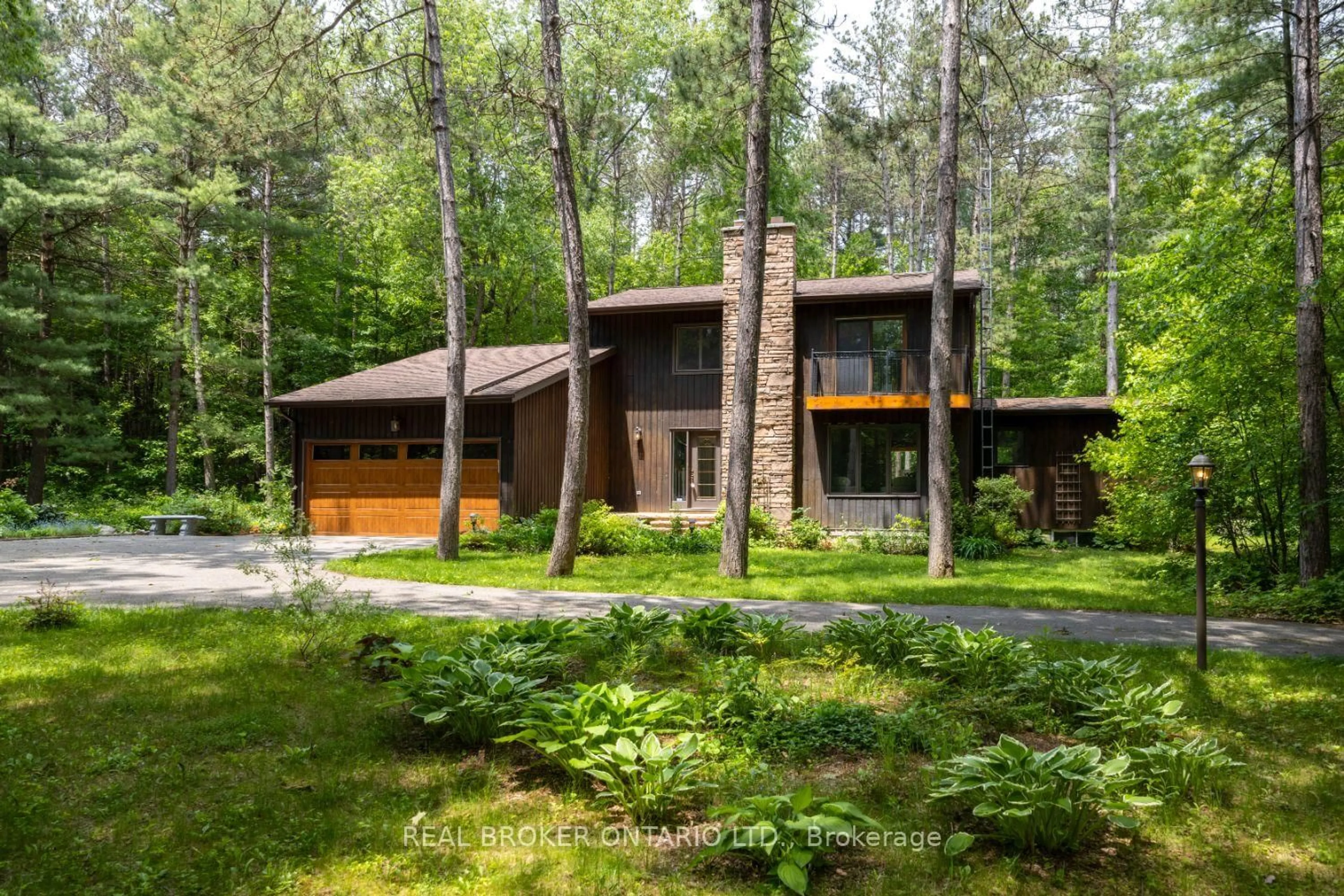Home with brick exterior material, forest/trees view for 2154 Concession Rd 10, Clarington Ontario L0B 1B0