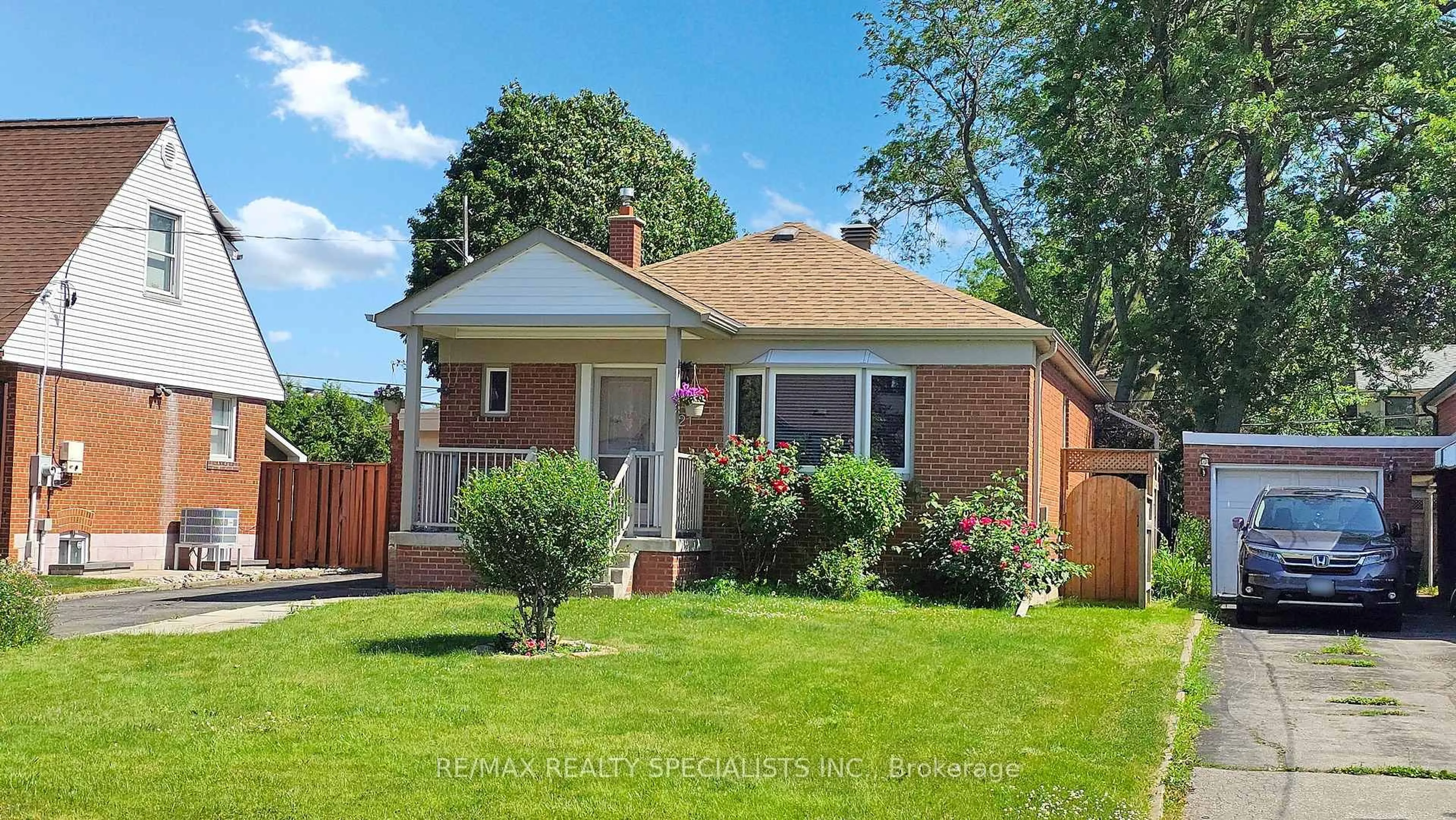 Home with brick exterior material, street for 21 Orlando Blvd, Toronto Ontario M1R 3N5