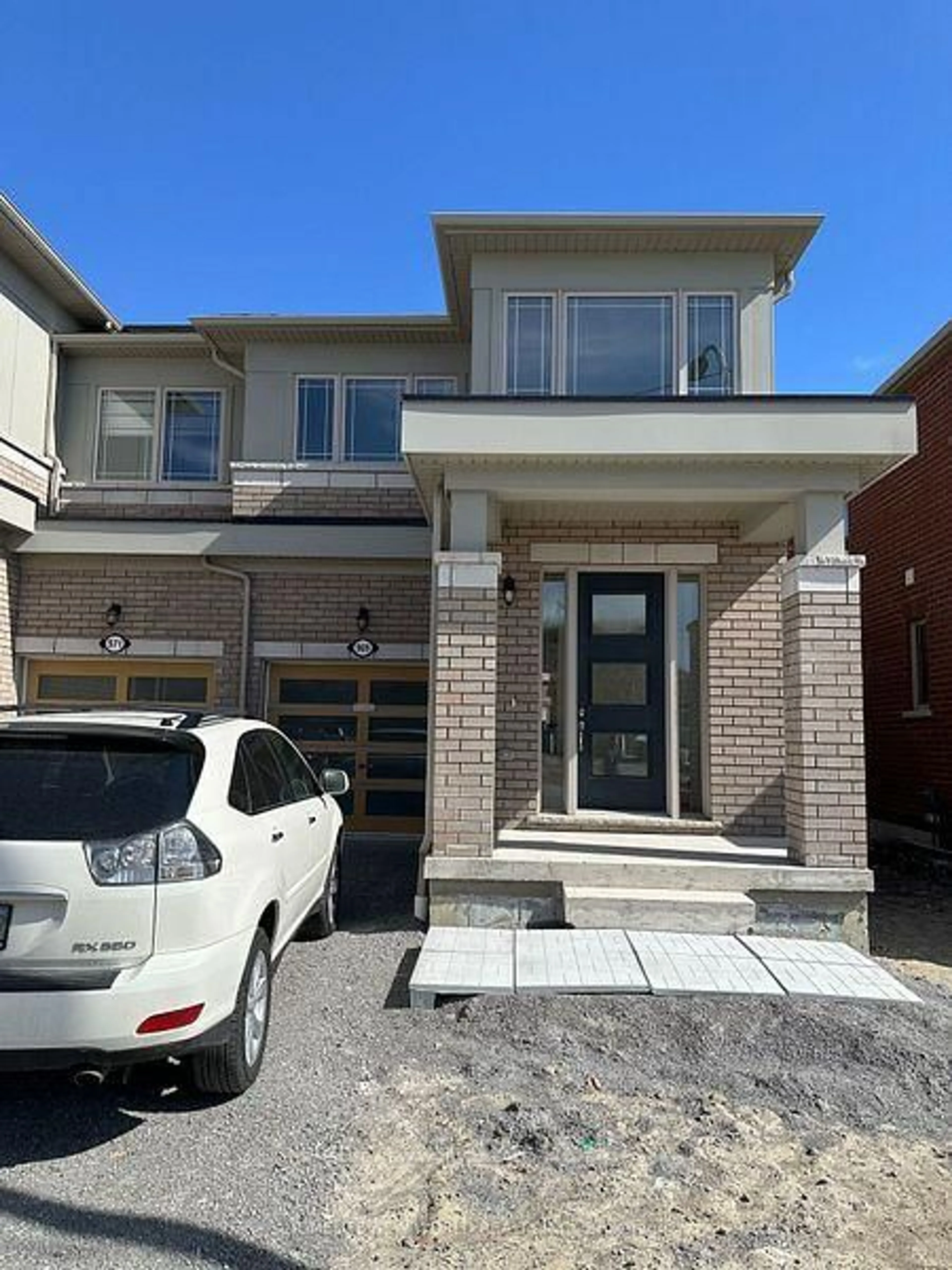 Home with brick exterior material, street for 969 Elizabeth Mackenzie Dr, Pickering Ontario L1X 0P5