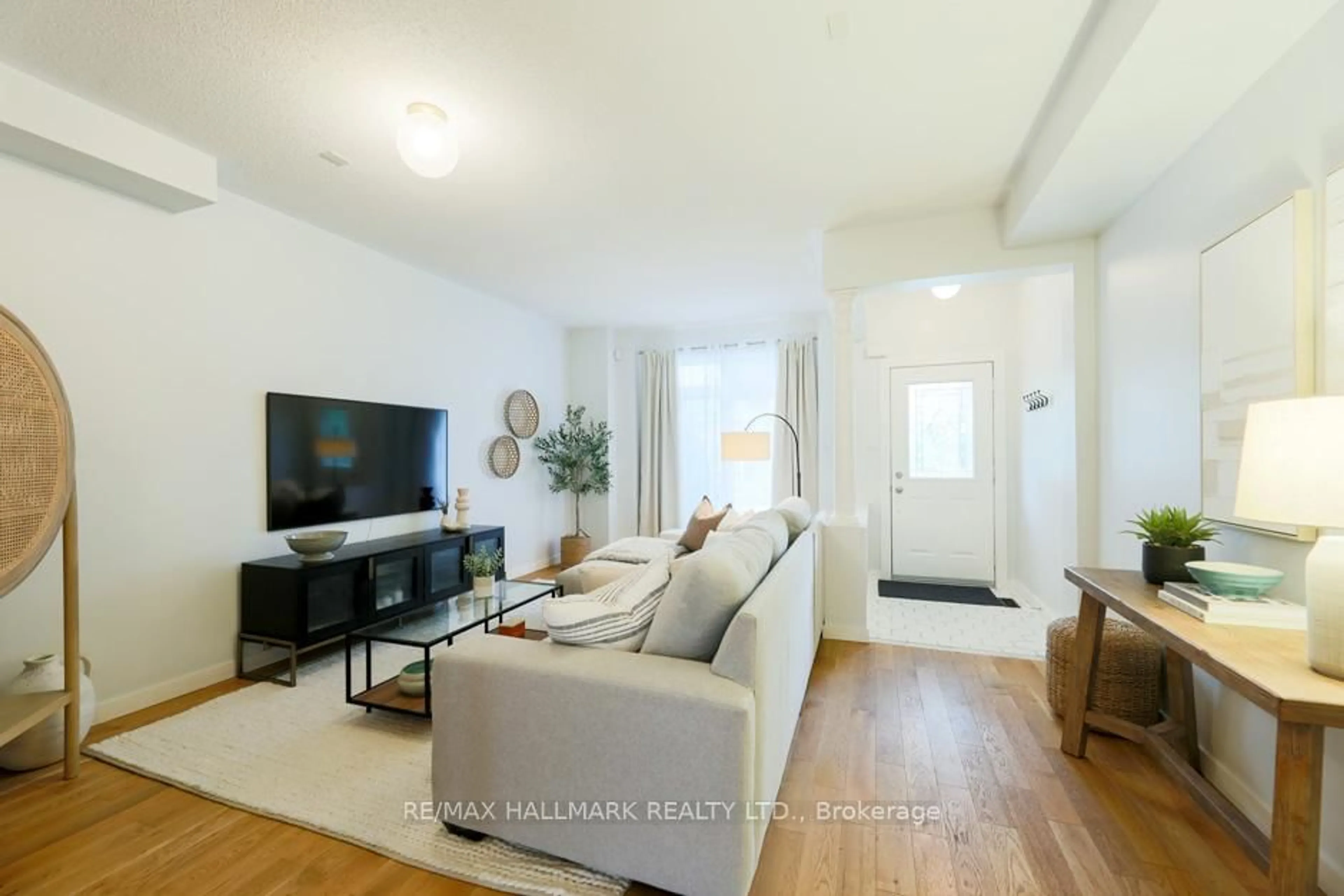 Living room with furniture, unknown for 80 Crossovers St, Toronto Ontario M4E 3X4