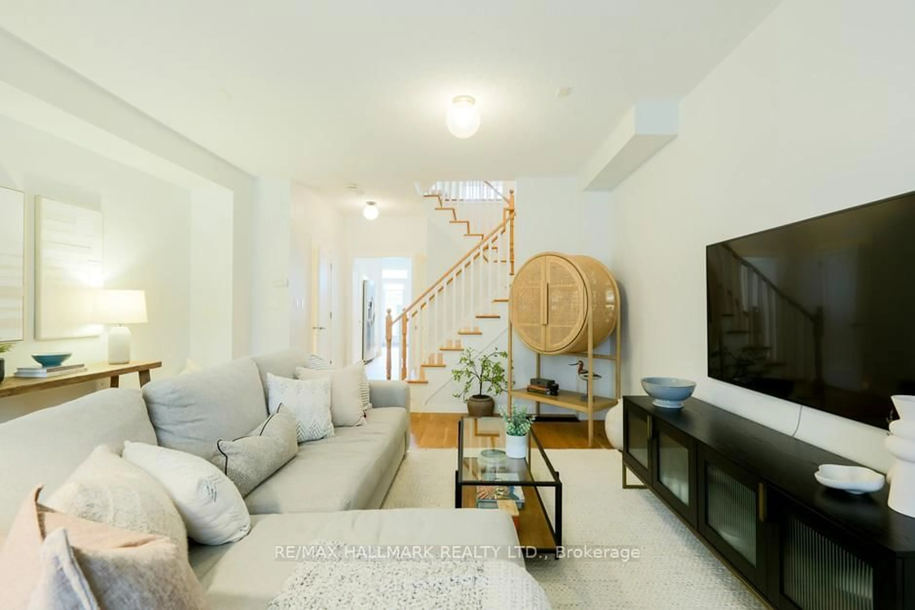 Living room with furniture, unknown for 80 Crossovers St, Toronto Ontario M4E 3X4