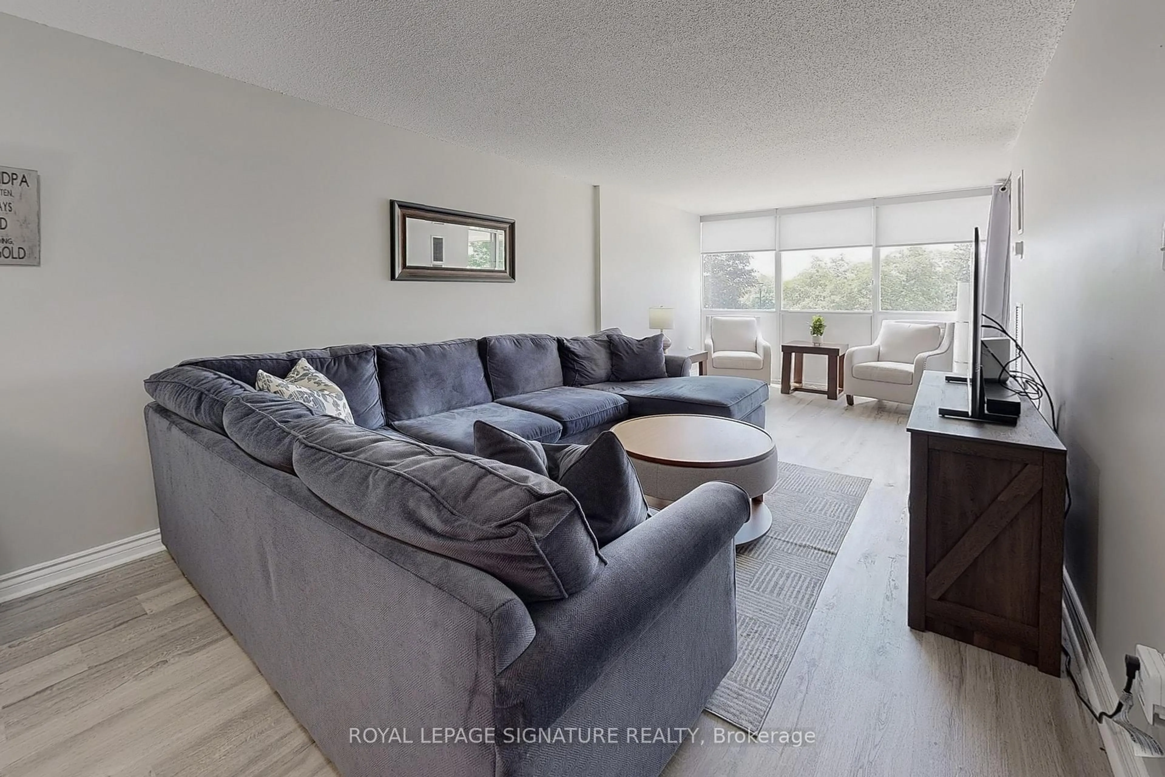 Living room with furniture, unknown for 66 Falby Crt #211, Ajax Ontario L1S 3L2