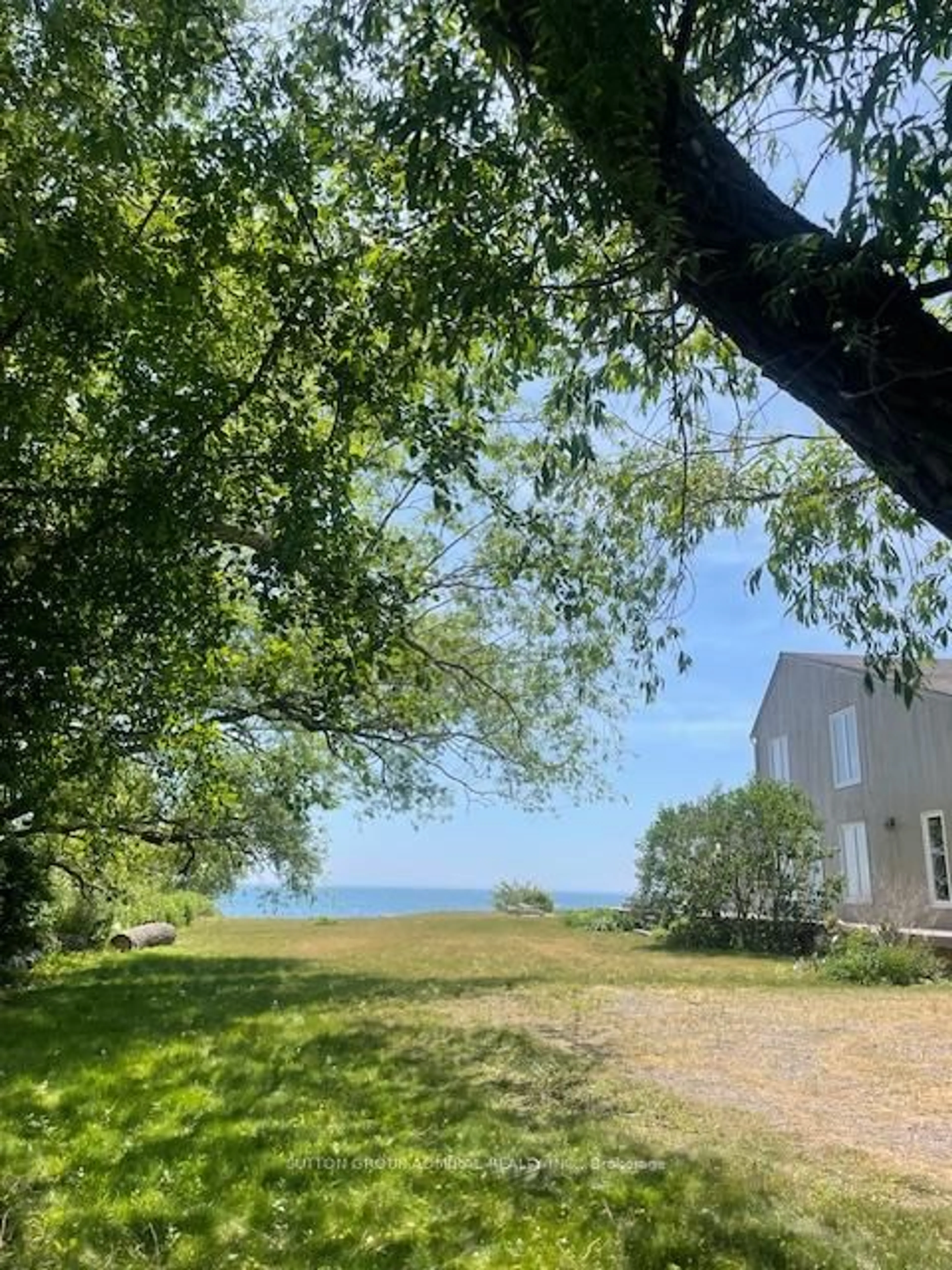 A pic from outside/outdoor area/front of a property/back of a property/a pic from drone, water/lake/river/ocean view for 151 Cedar Crest Beach Rd, Clarington Ontario L1C 5R2