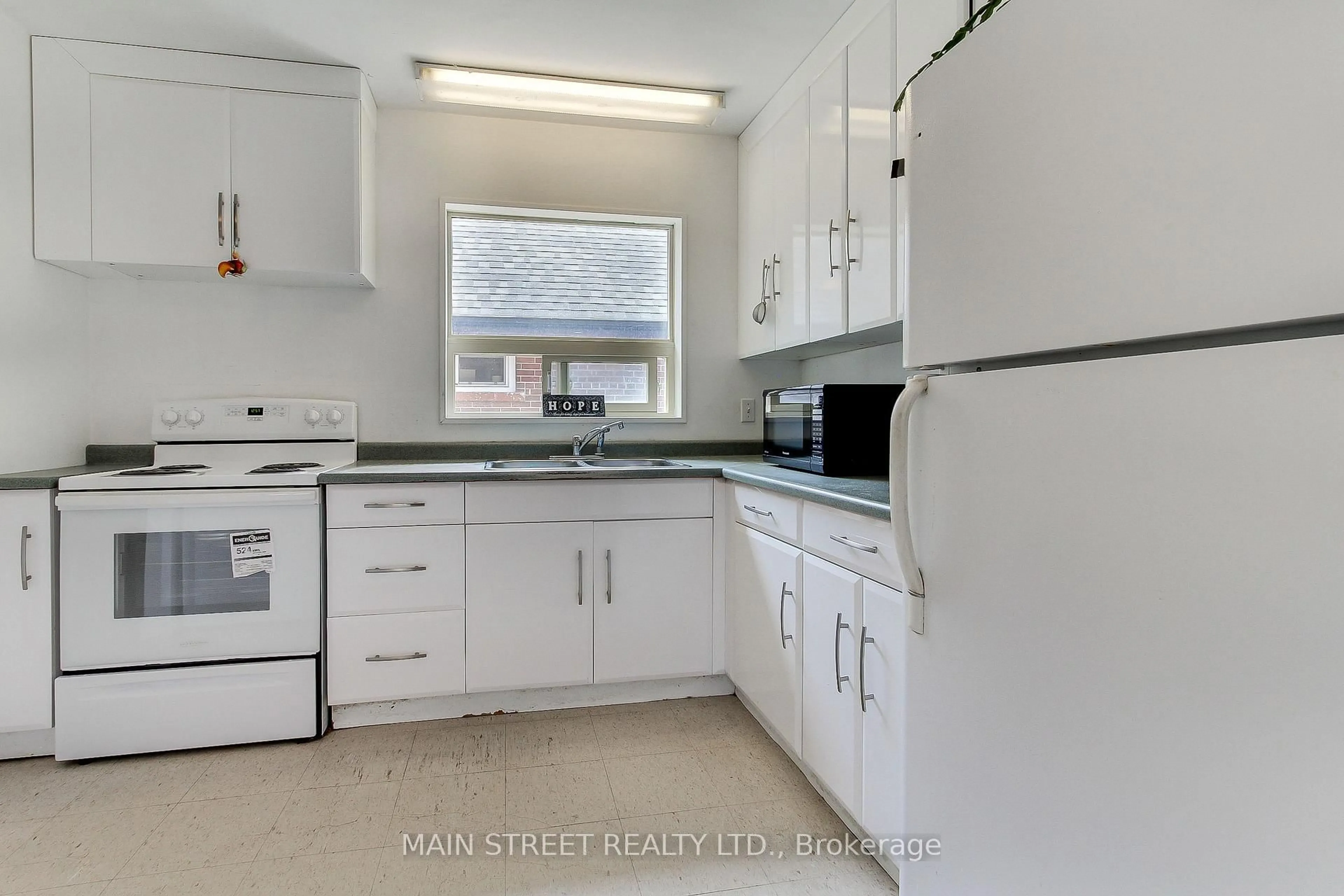Standard kitchen, ceramic/tile floor for 282 Warden Ave, Toronto Ontario M1N 3A2