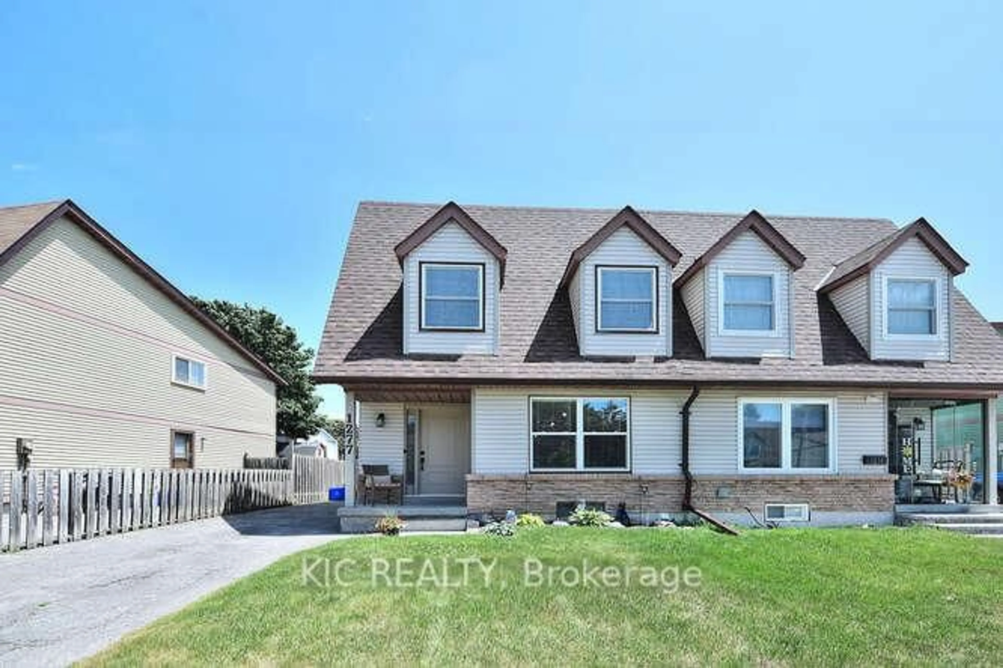 Home with vinyl exterior material, street for 1277 Trowbridge Dr, Oshawa Ontario L1G 7K4