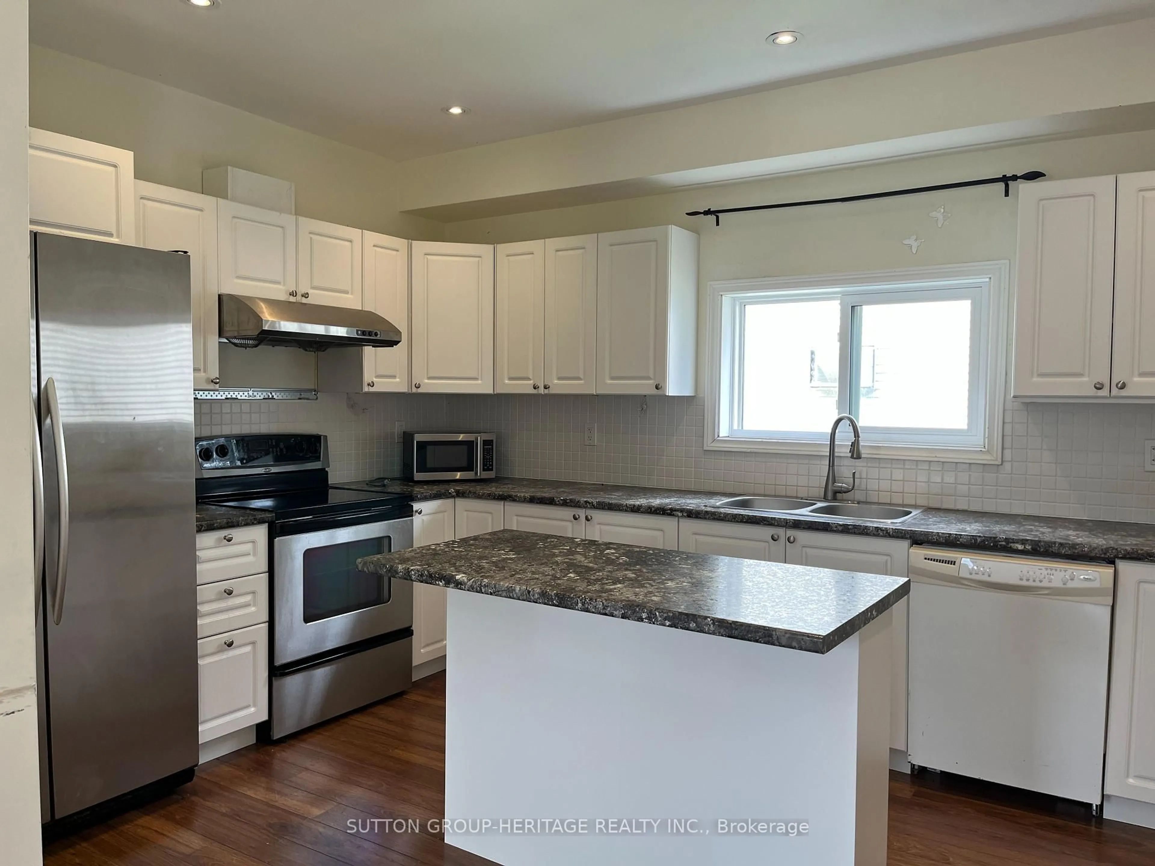 Open concept kitchen, wood/laminate floor for 4973 Old Brock Rd, Pickering Ontario L1Y 1A9