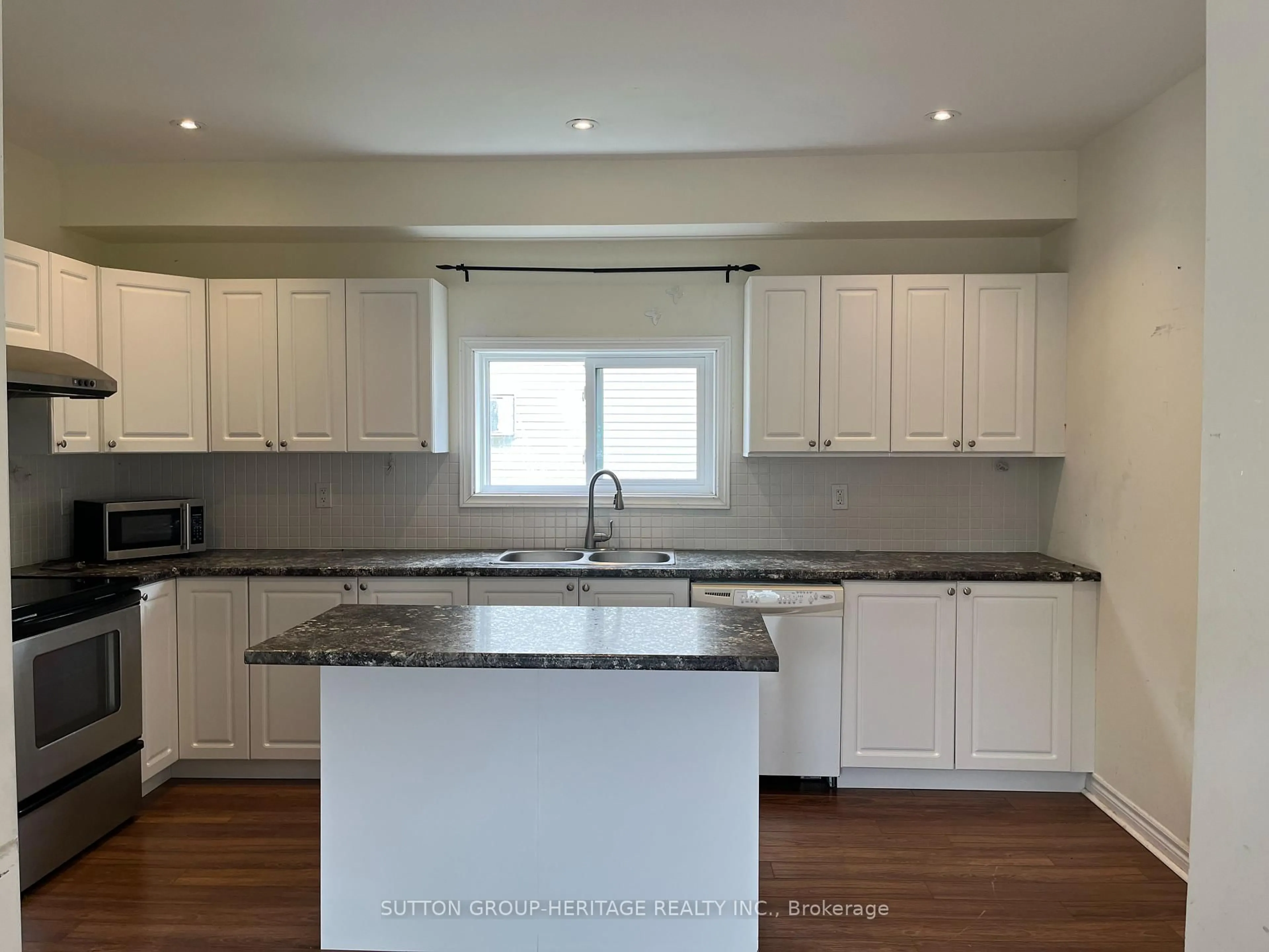 Open concept kitchen, wood/laminate floor for 4973 Old Brock Rd, Pickering Ontario L1Y 1A9