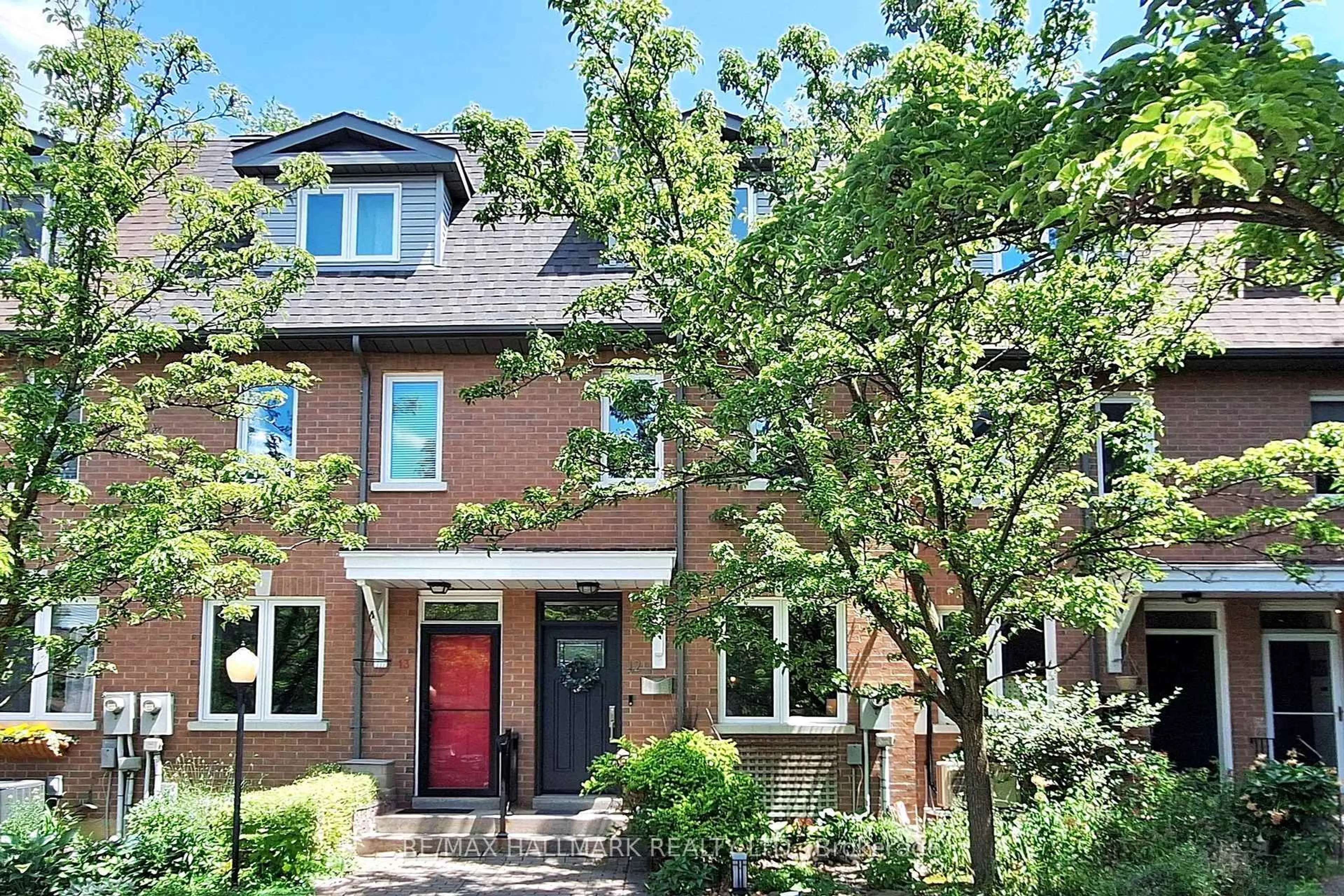 Home with brick exterior material, street for 99 Goodwood Park Crt #12, Toronto Ontario M4C 5S9