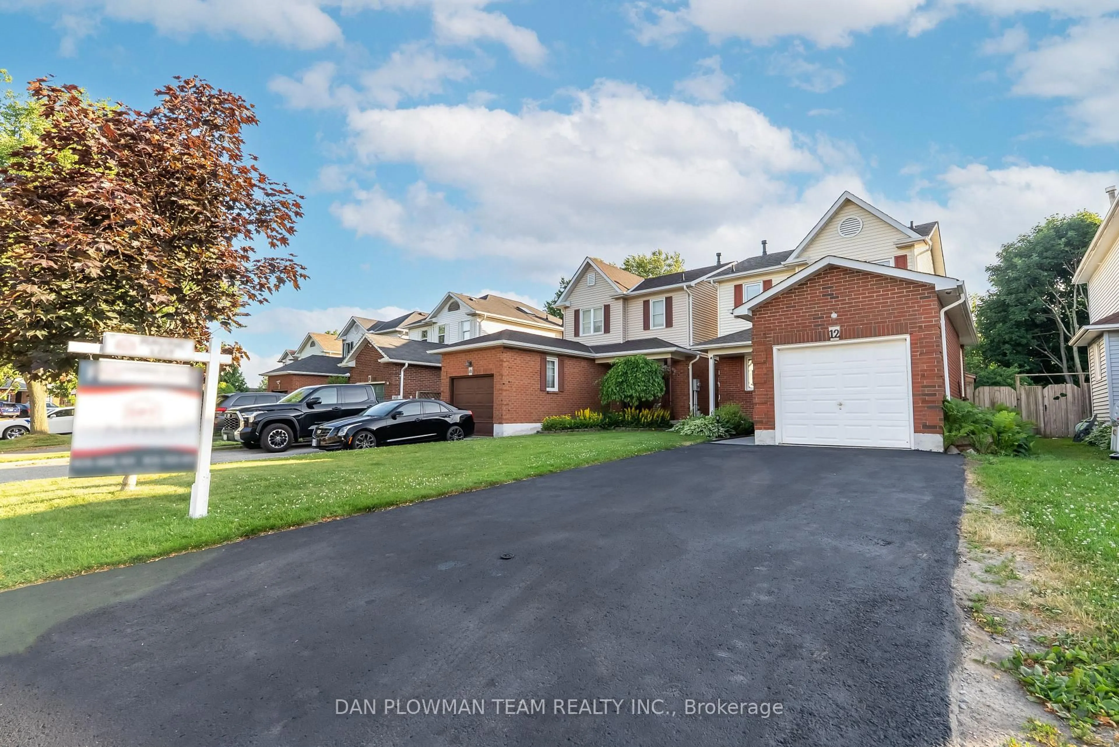 A pic from outside/outdoor area/front of a property/back of a property/a pic from drone, unknown for 12 Longwood Crt, Clarington Ontario L1E 1R8