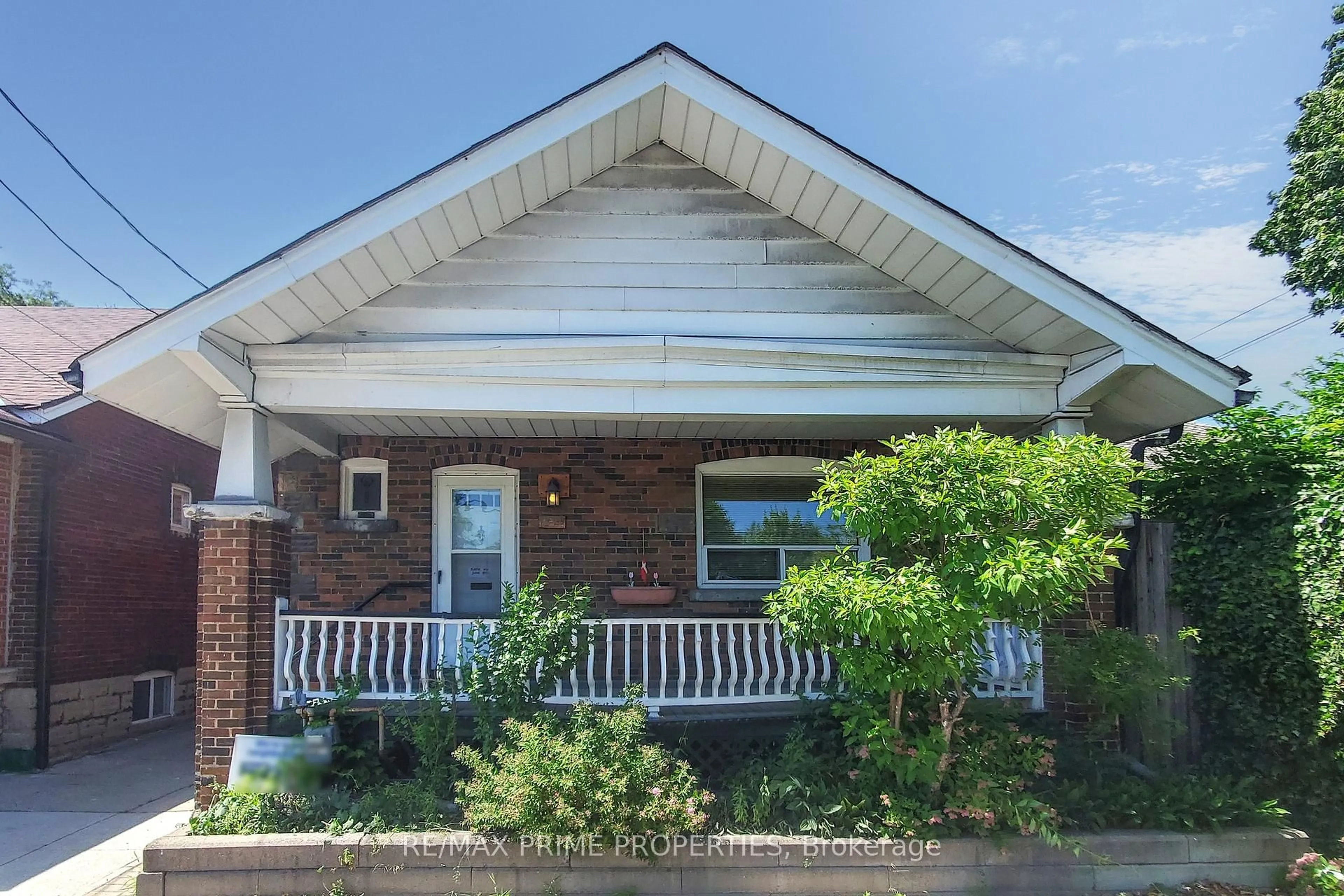 Home with brick exterior material, street for 1398 Pape Ave, Toronto Ontario M4K 3X5