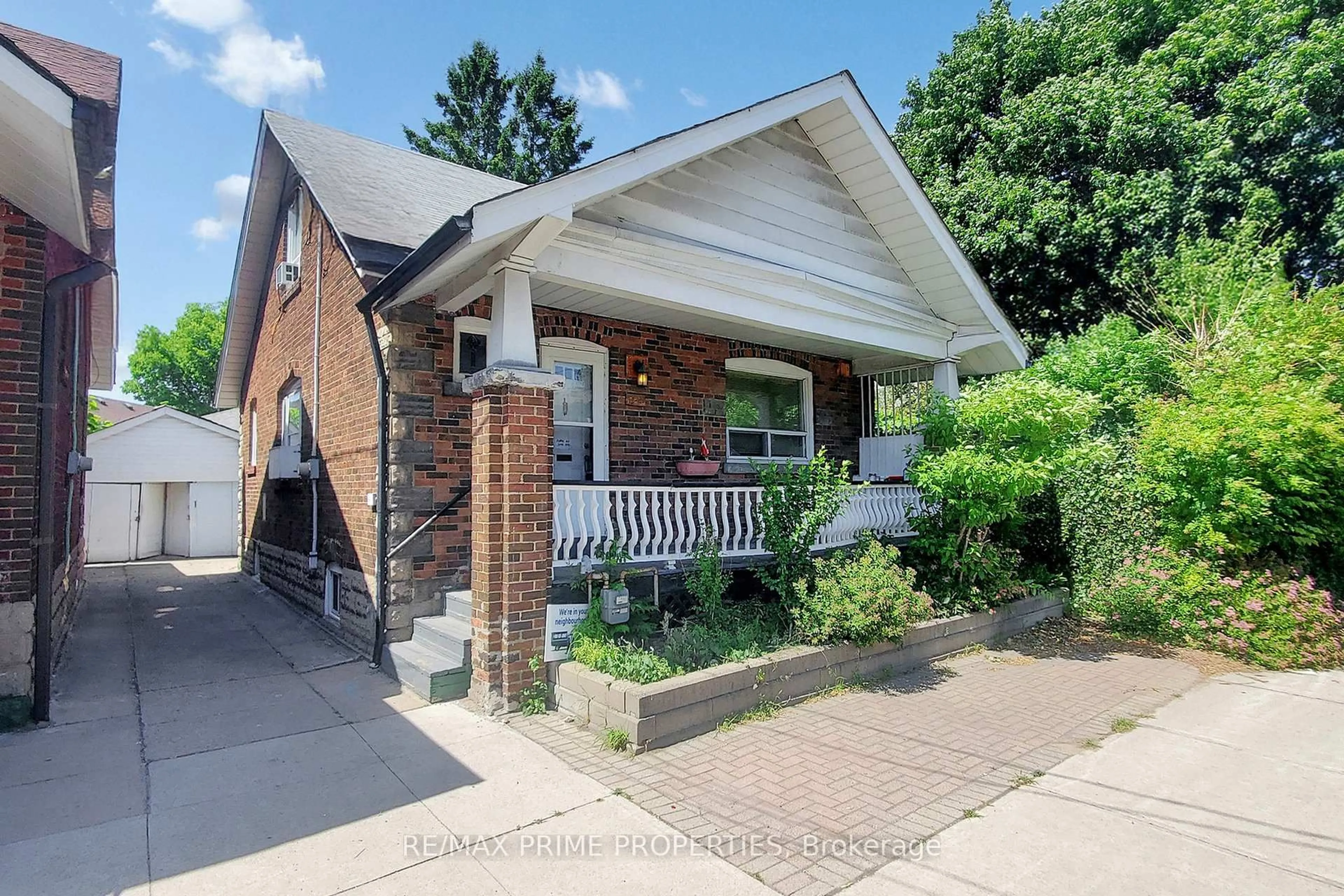 Home with brick exterior material, street for 1398 Pape Ave, Toronto Ontario M4K 3X5