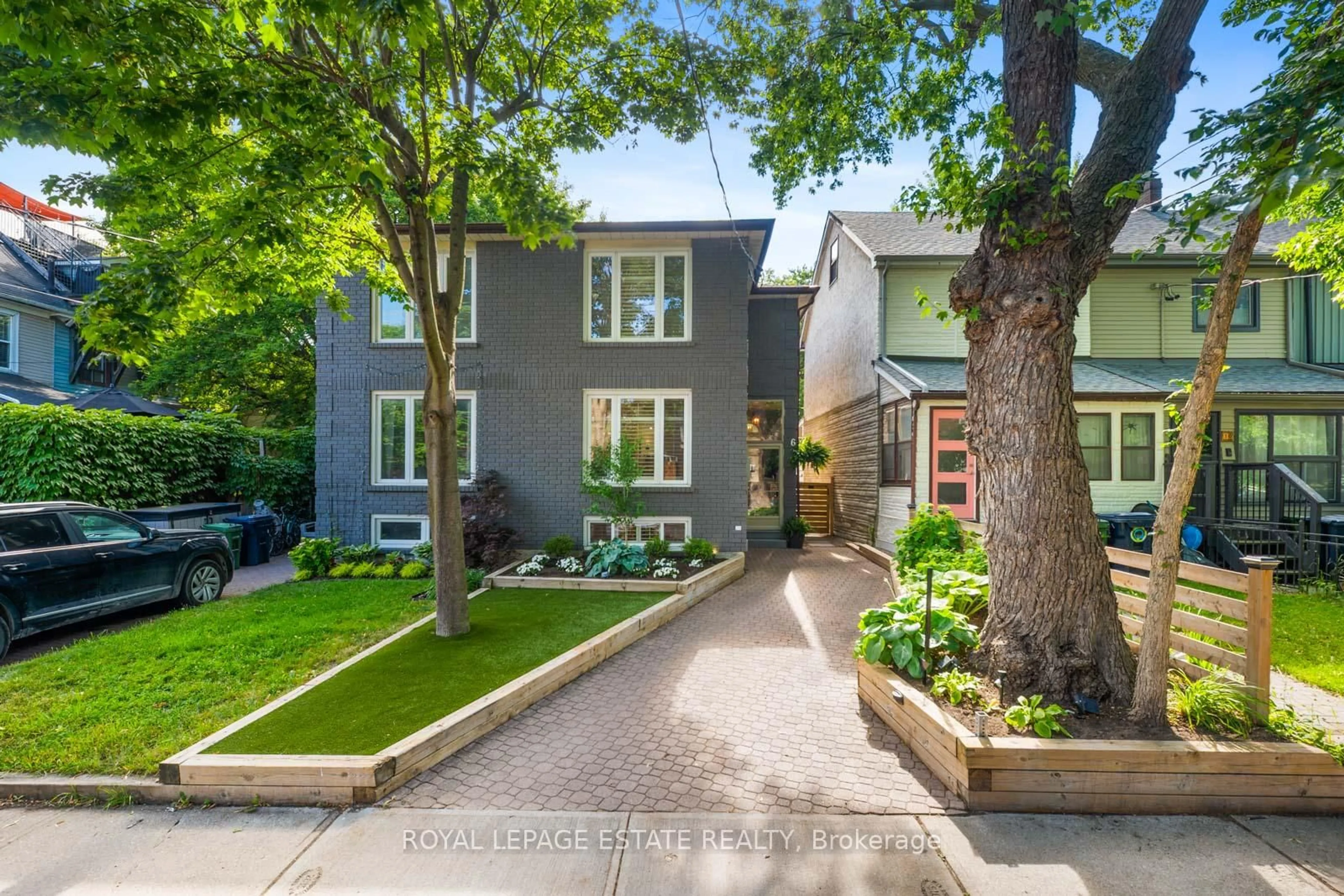 Home with brick exterior material, street for 6 Woodfield Rd, Toronto Ontario M4L 2W3