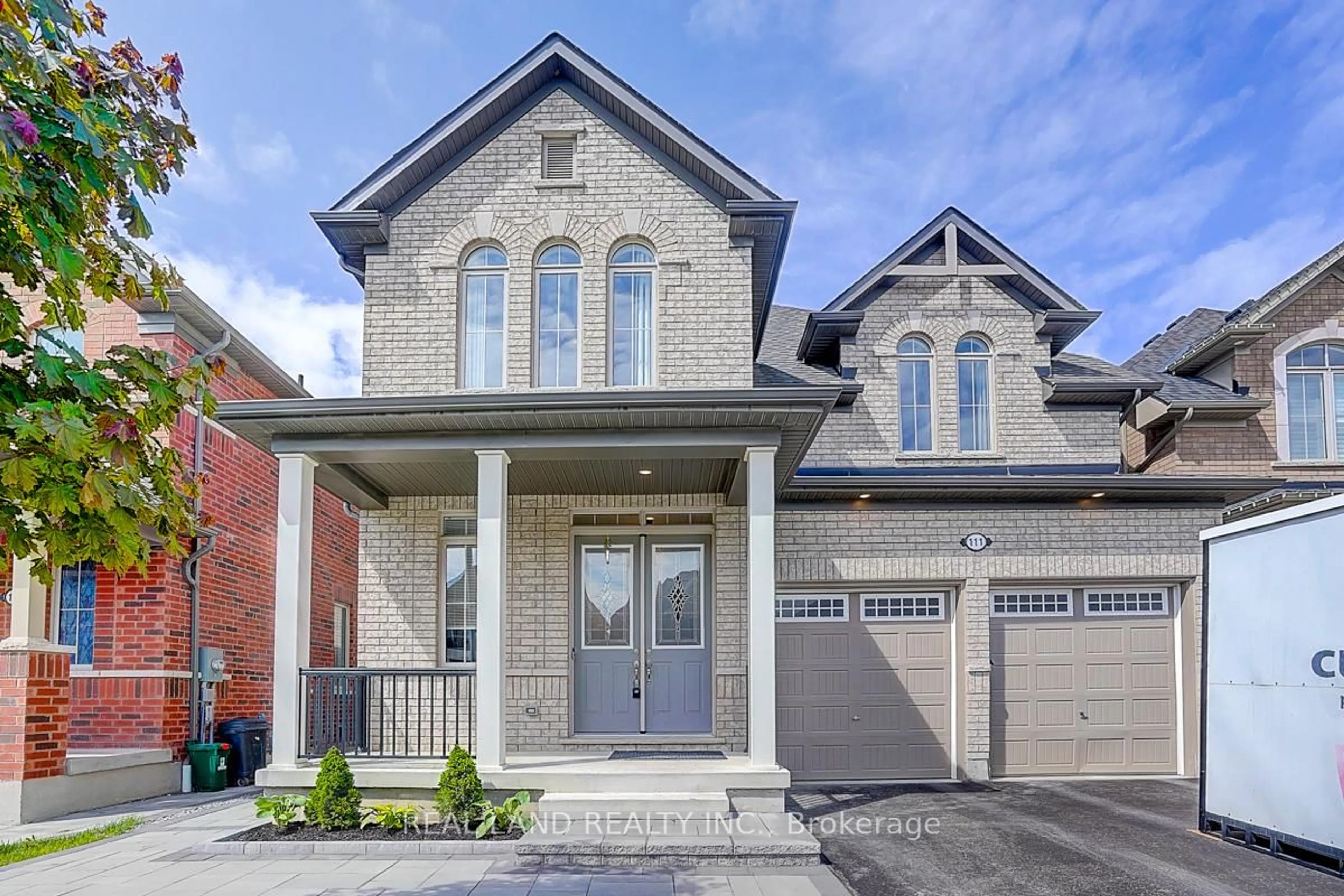 Home with brick exterior material, street for 111 Auckland Dr, Whitby Ontario L1P 0J4