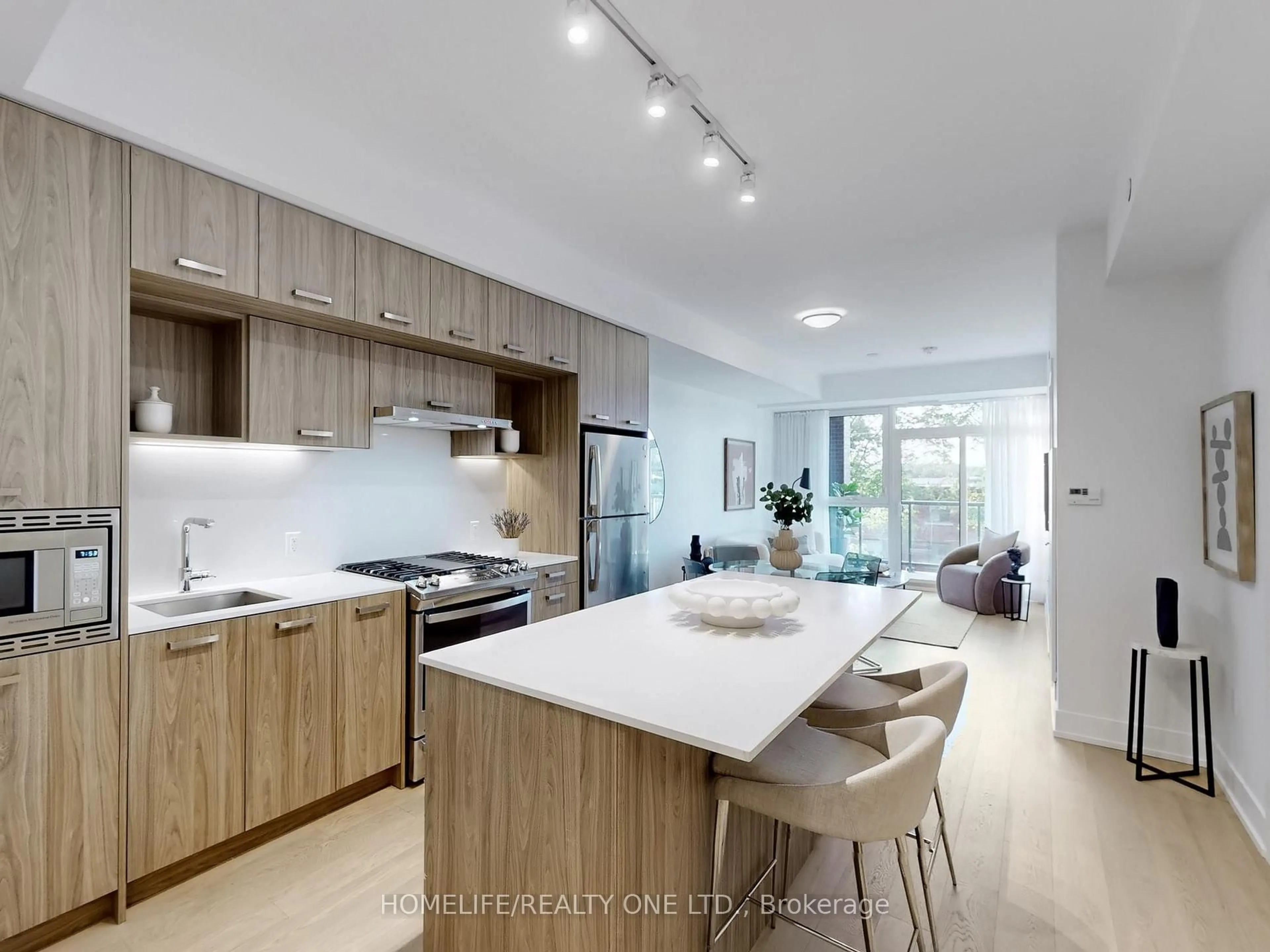 Open concept kitchen, unknown for 1331 Queen St #402, Toronto Ontario M4L 0B1
